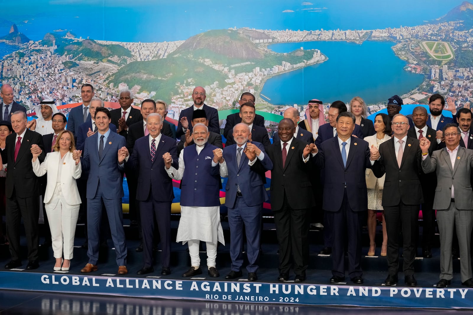 FILE - Chinese President Xi Jinping, third right in front, and world leaders attending the G20 Summit pose for a group photo in Rio de Janeiro on Nov. 19, 2024. (AP Photo/Eraldo Peres, File)