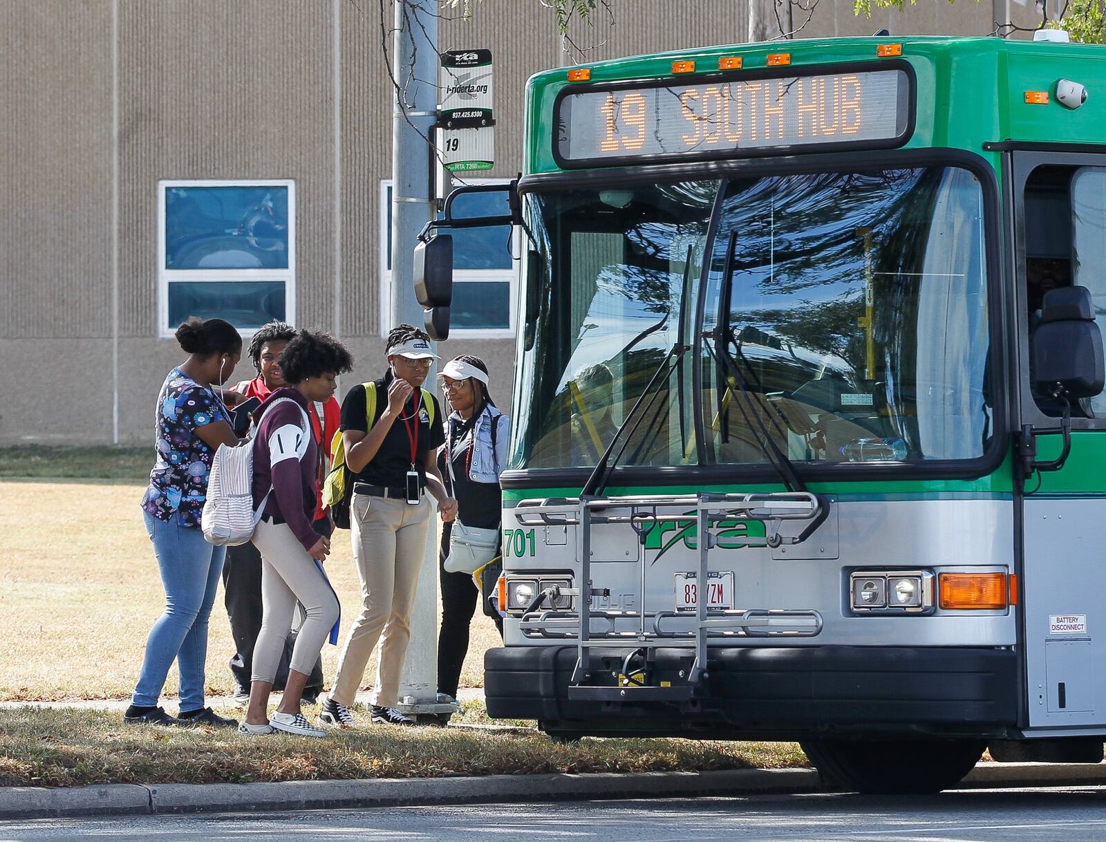 Dayton Public Schools reintroduced busing for high school students this fall, with a temporary system through September, then special “limited service” RTA routes since then. CHRIS STEWART / STAFF