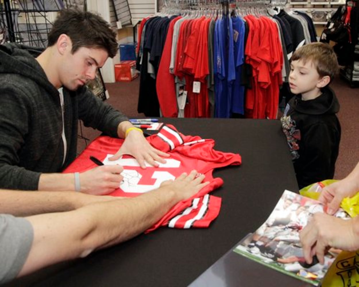 OSU's Dane Sanzenbacher signs autographs