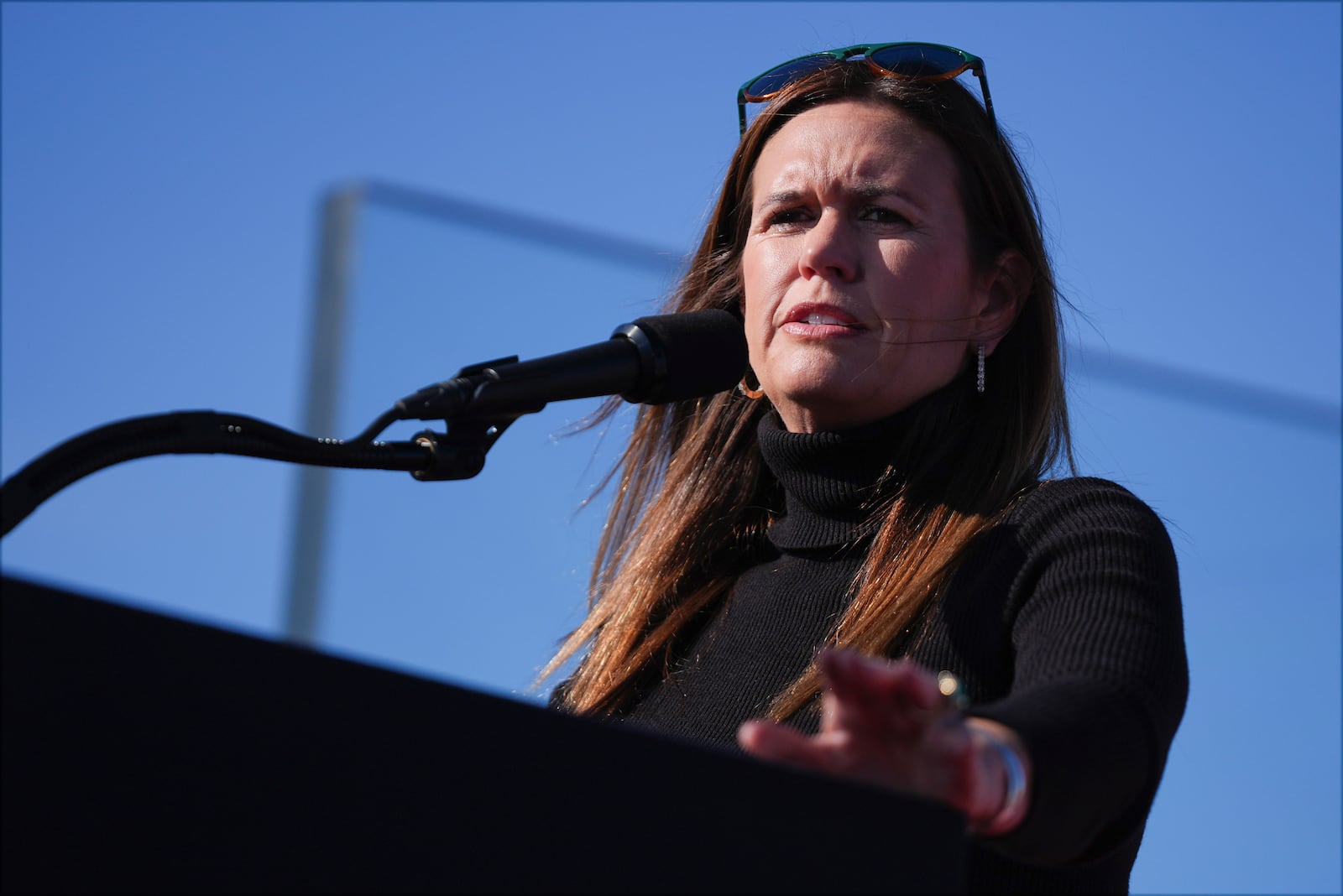 FILE - Arkansas Gov. Sarah Huckabee Sanders speaks before Republican presidential nominee former President Donald Trump arrives for a campaign rally in Lititz, Pa., Nov. 3, 2024. (AP Photo/Evan Vucci, File)