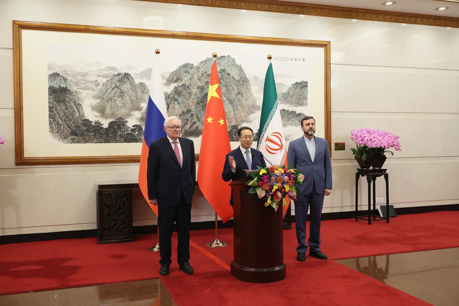 From left, Russian Deputy Foreign Minister Sergei Ryabkov, Chinese Vice Foreign Minister Ma Zhaoxu and Iranian Deputy Foreign Minister Kazem Gharibabadi meet with reporters after their meeting at Diaoyutai State Guest House on March 14, 2025 in Beijing, China.(Lintao Zhang/Pool Photo via AP)