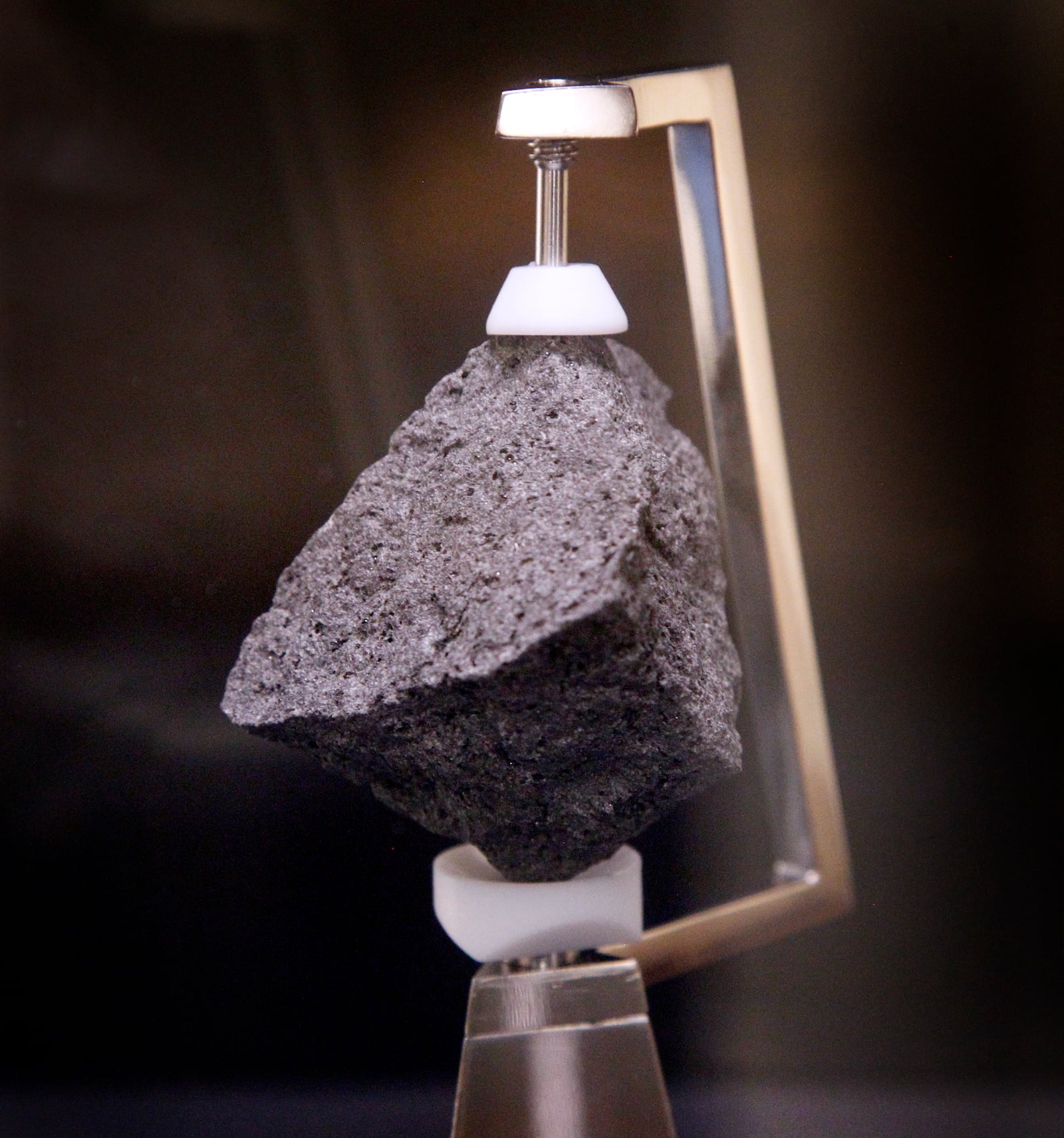 Neil Armstrong and the crew of the Apollo 11 collected lunar samples - space rocks - in 1969. One of those samples is on display at the Armstrong Air & Space Museum in Wapakoneta. LISA POWELL / STAFF