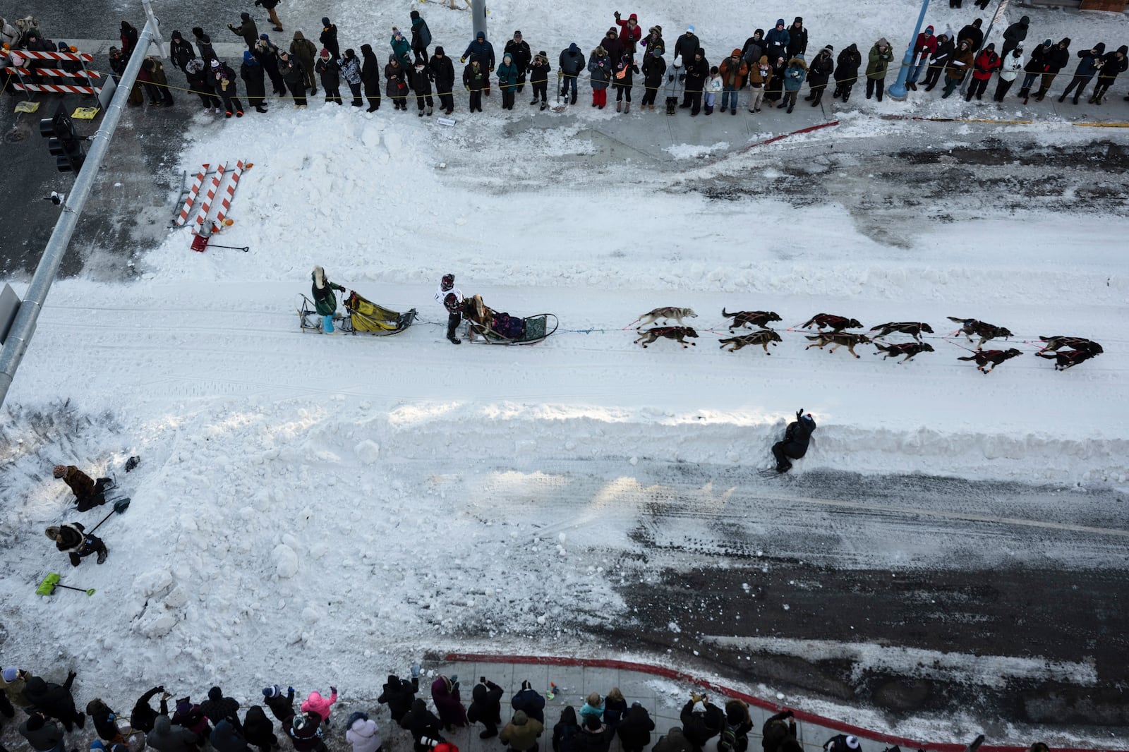 FILE - A musher leaves downtown during the ceremonial start of the Iditarod Trail Dog Sled Race on Saturday, March 2, 2024, in Anchorage, Alaska. (Marc Lester/Anchorage Daily News via AP, File)