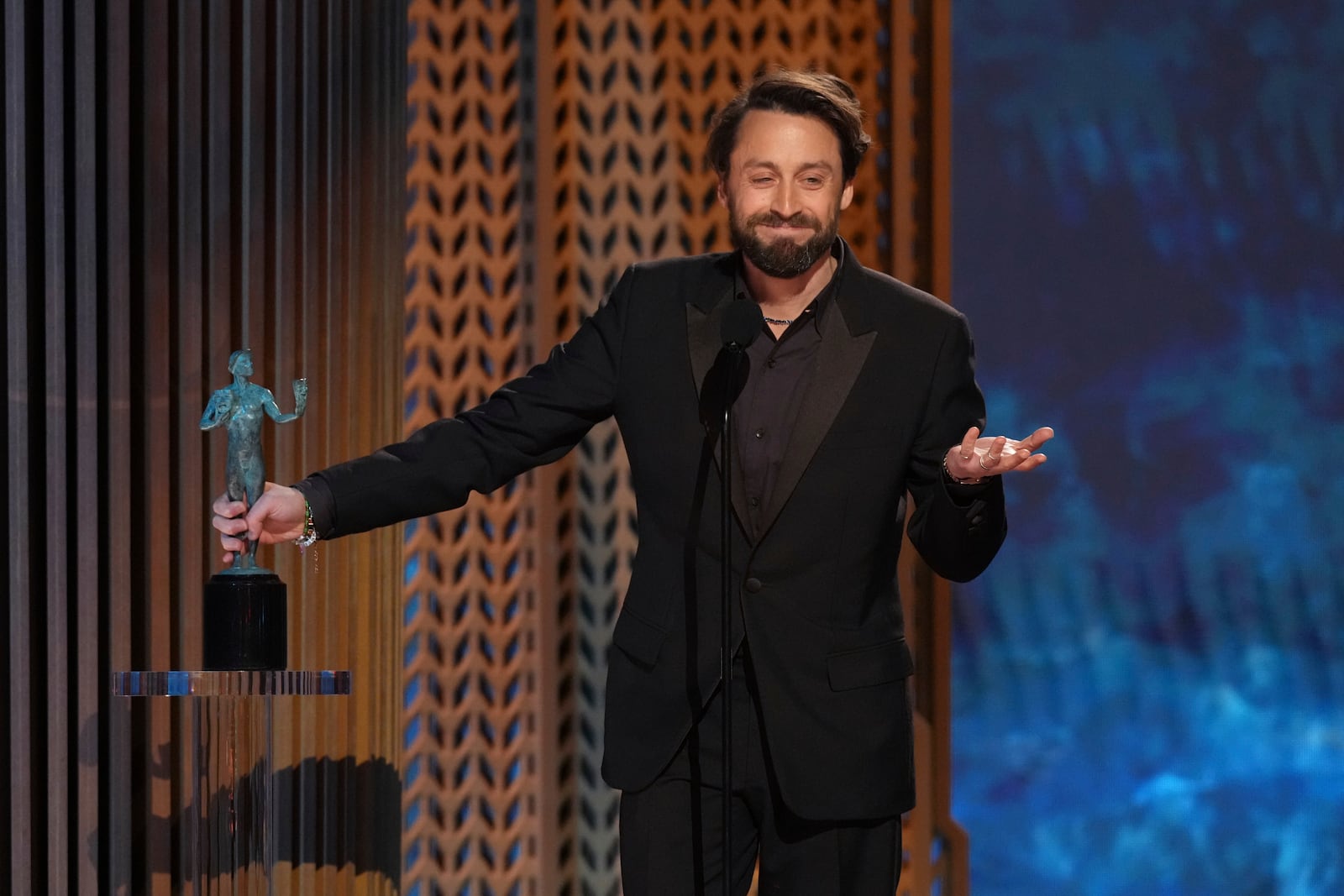 Kieran Culkin accepts the award for outstanding performance by a male actor in a supporting role for "A Real Pain" during the 31st annual Screen Actors Guild Awards on Sunday, Feb. 23, 2025, at the Shrine Auditorium in Los Angeles. (AP Photo/Chris Pizzello)