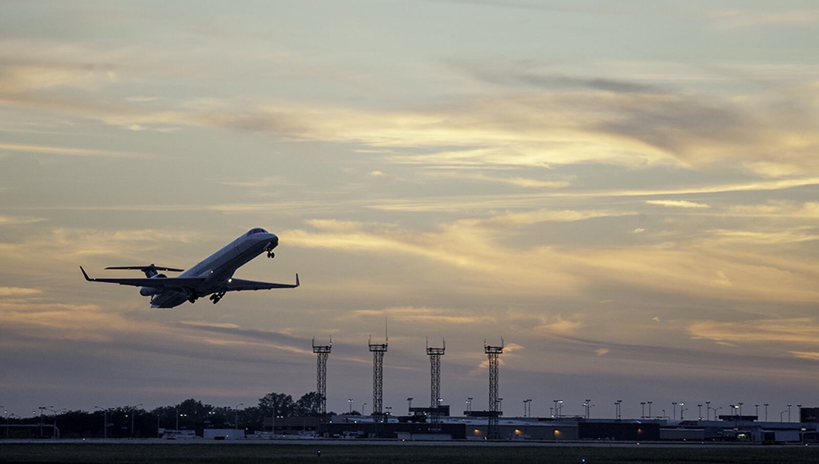 A jet airplane takes off at the Dayton International Airport on Wednesday Dec. 11, 2019.