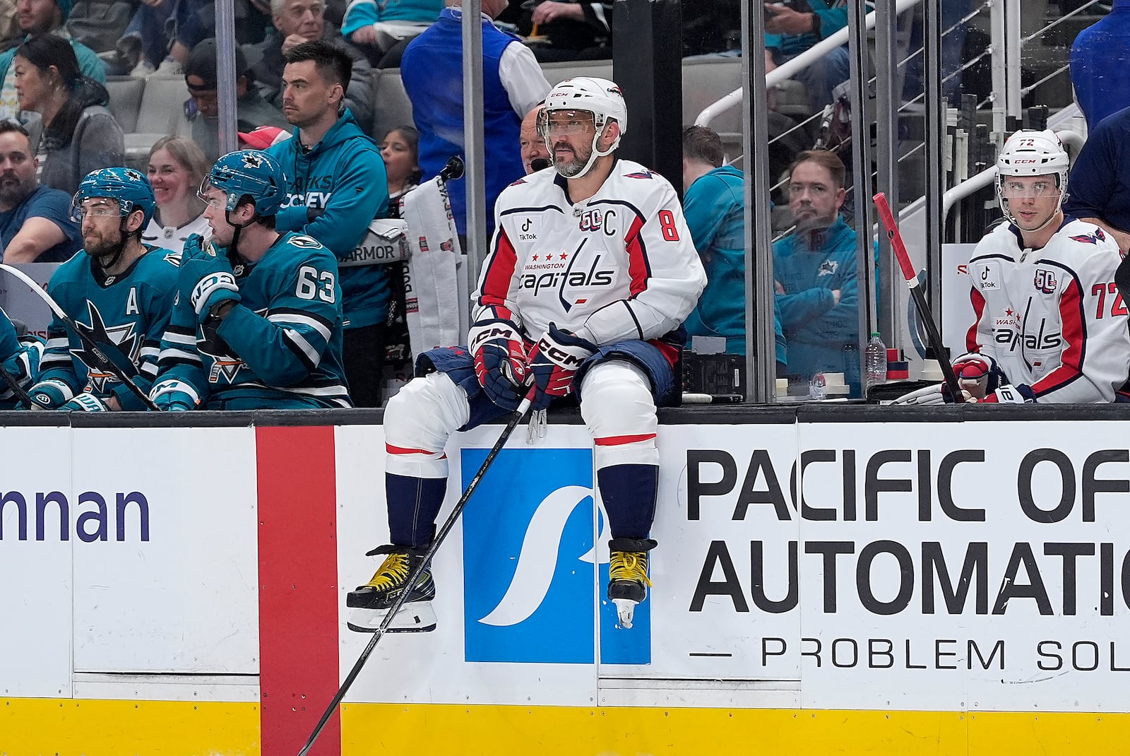 Washington Capitals left wing Alex Ovechkin (8) sits on the rail during a timeout against the San Jose Sharks in the first period of an NHL hockey game in San Jose, Calif., Saturday, March 15, 2025. (AP Photo/Tony Avelar)