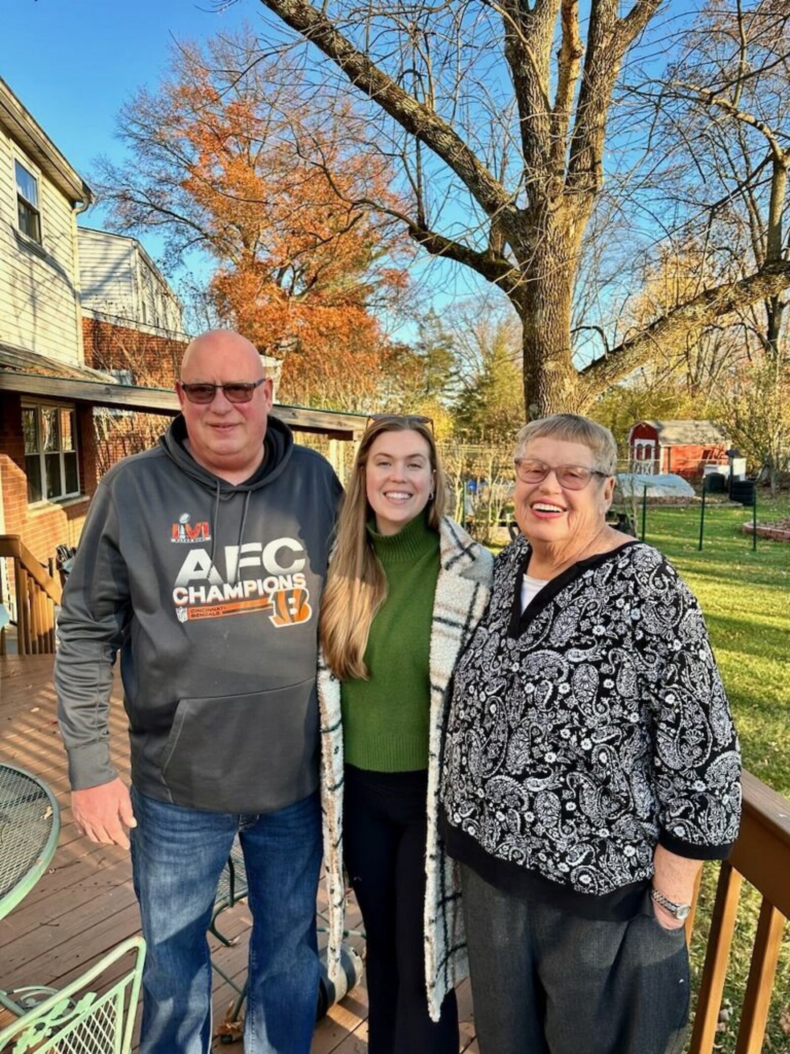 T.J. Justice of Moraine won third place in the Cox First Media tailgate recipe contest for his southern style hot wings. He is pictured with his daughter, Natalie, and his mom, Judy (CONTRIBUTED PHOTO).