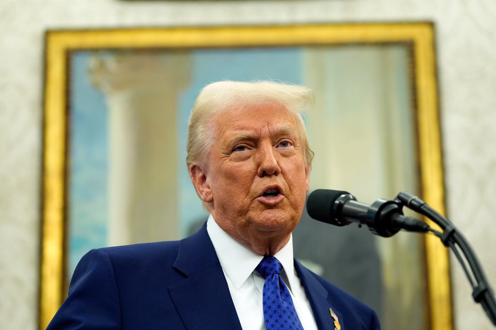 President Donald Trump speaks as Tulsi Gabbard is sworn in as the Director of National Intelligence in the Oval Office of the White House, Wednesday, Feb. 12, 2025, in Washington. (Photo/Alex Brandon)