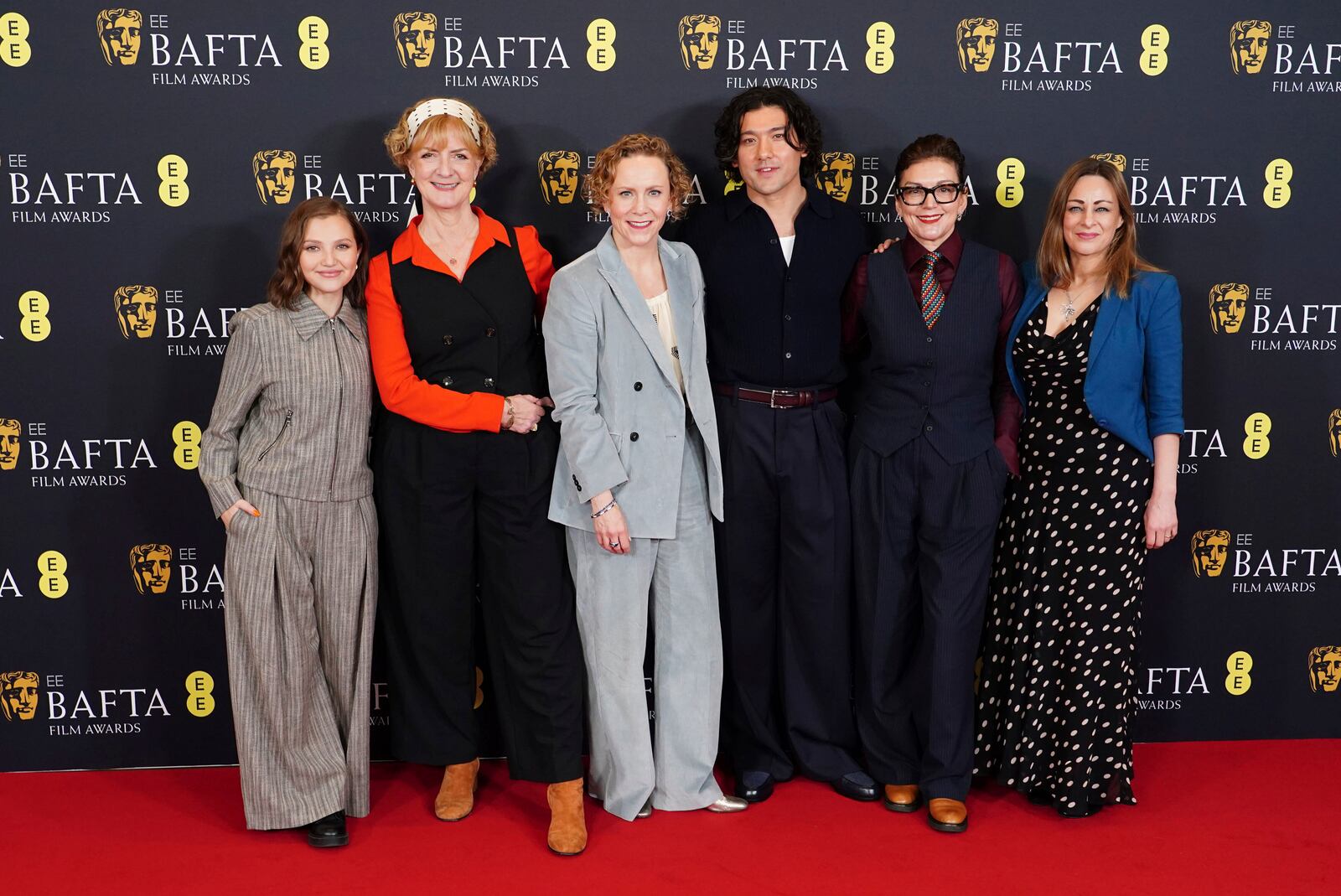 From left, Mia McKenna-Bruce, Sara Putt, Anna Higgs, Will Sharpe, Jane Millichip, and Emma Baehr attend the BAFTA Film Awards 2025 nominations announcement, at BAFTA, in central London, Wednesday, Jan. 15, 2025. (Ian West/PA via AP)