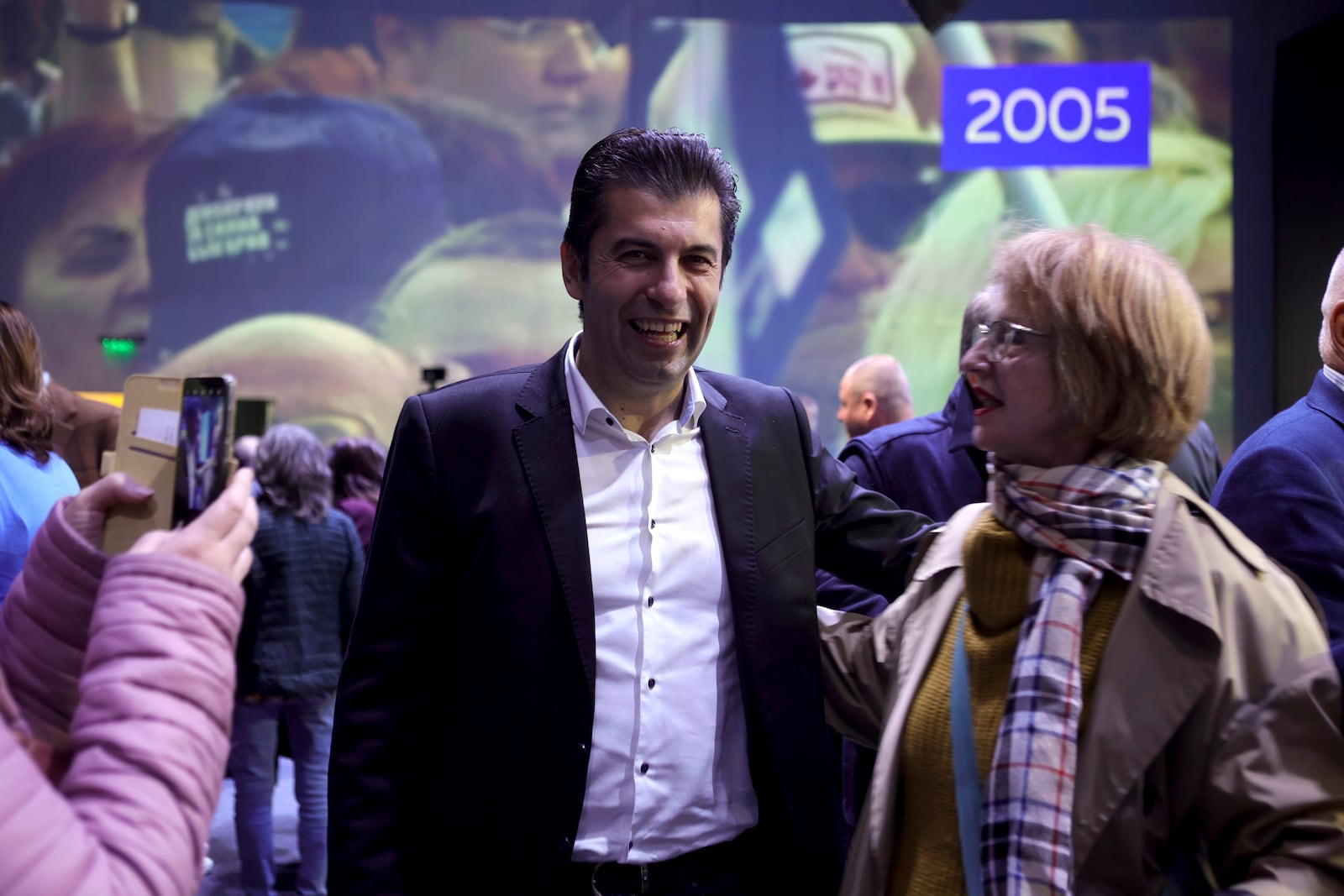 Kiril Petkov, leader of We Continue the Change party, is seen among his supporters Sunday, Oct. 20, 2024, in Sofia, as Bulgarians are called to cast ballots on Sunday in the seventh general elections in just over three years. (AP Photo/Valentina Petrova)