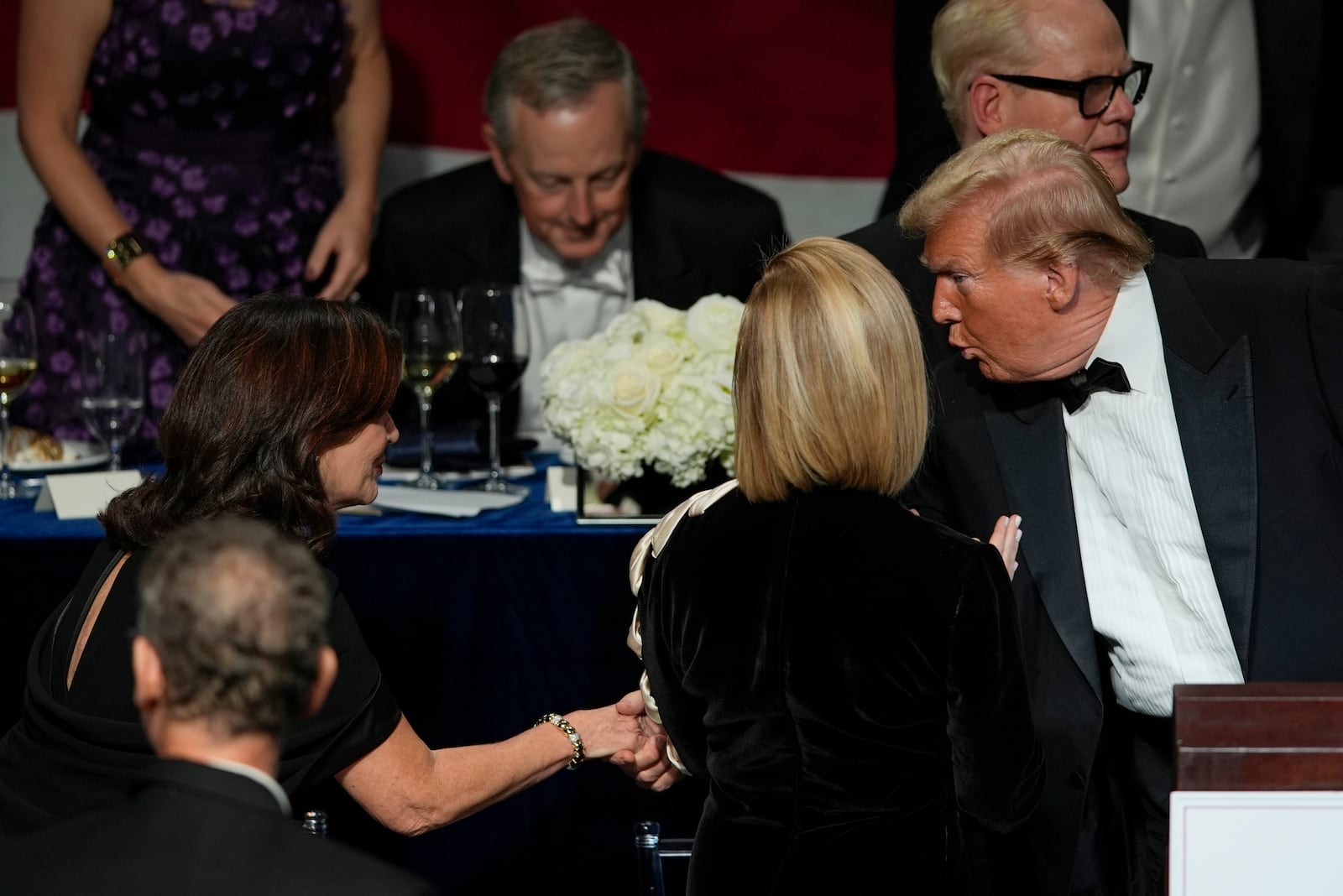 FILE - Republican presidential nominee former President Donald Trump shakes hands with New York Gov. Kathy Hochul at the 79th annual Alfred E. Smith Memorial Foundation Dinner, in New York, Oct. 17, 2024. (AP Photo/Julia Demaree Nikhinson, File)