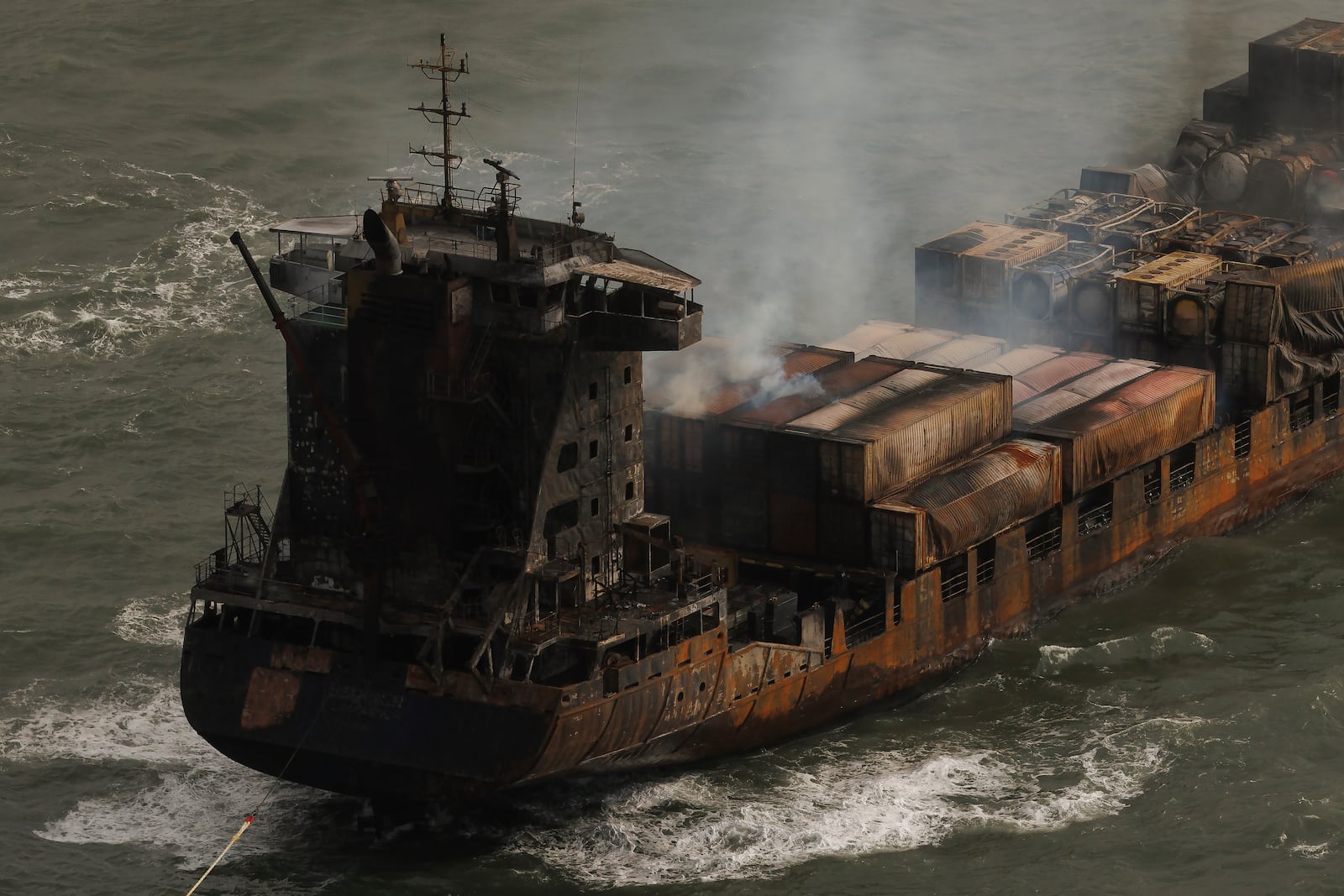 Smoke billows from the MV Solong cargo ship in the North Sea, off the Yorkshire coast, Tuesday, March 11, 2025, England. (Dan Kitwood/Pool Photo via AP)