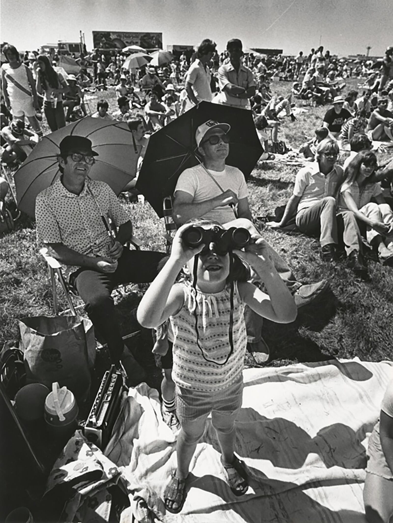 Six-year-old Shannon Kennedy keeps close watch on the sky with her binoculars at the 1980 Dayton Air Show. DAYTON DAILY NEWS ARCHIVES