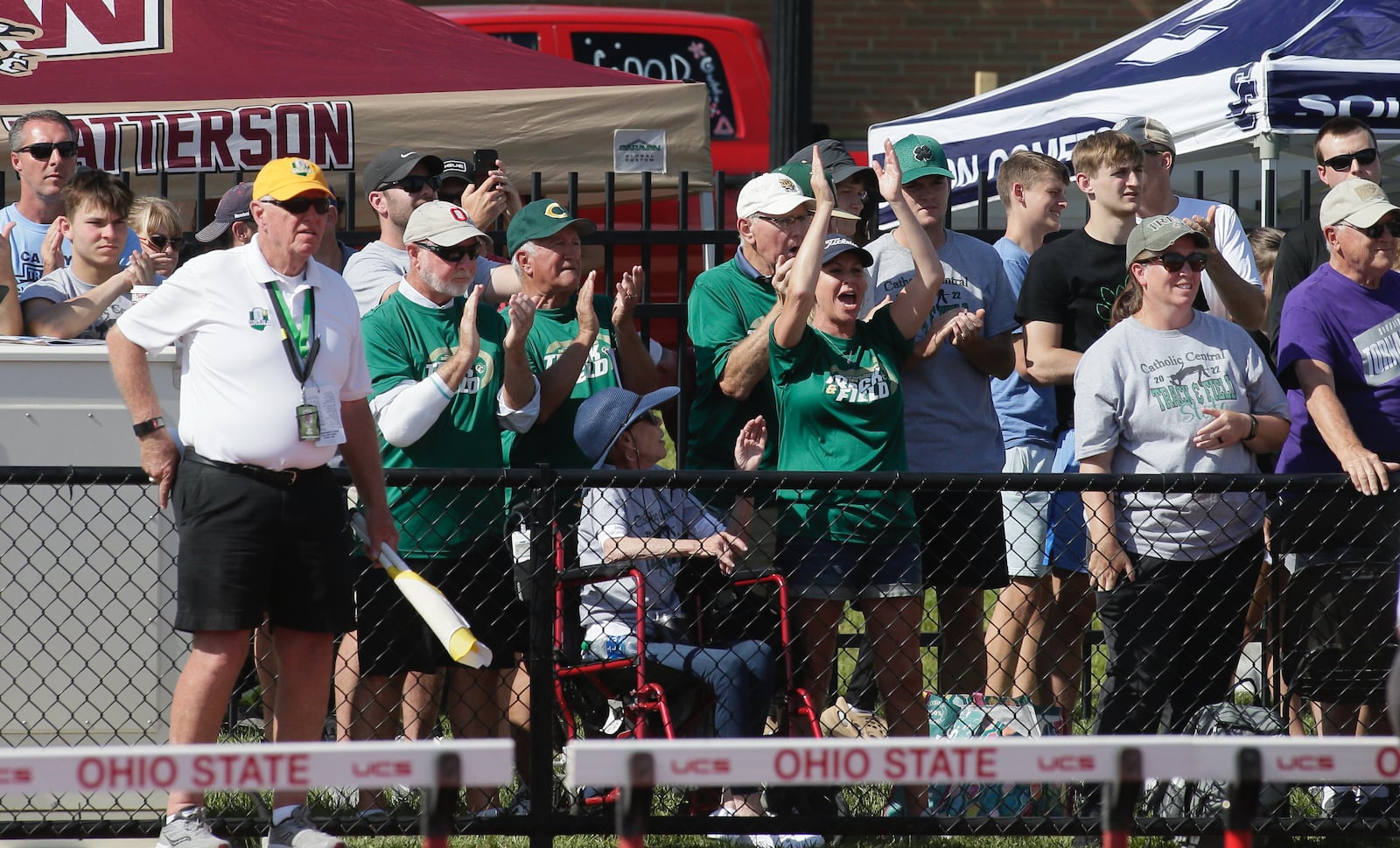 Fans cheer for Catholic Central's Mallory Mullen as she competes in the high jump in the Division III state track championship on Friday, June 3, 2022, at Jesse Owens Memorial Stadium in Columbus. David Jablonski/Staff