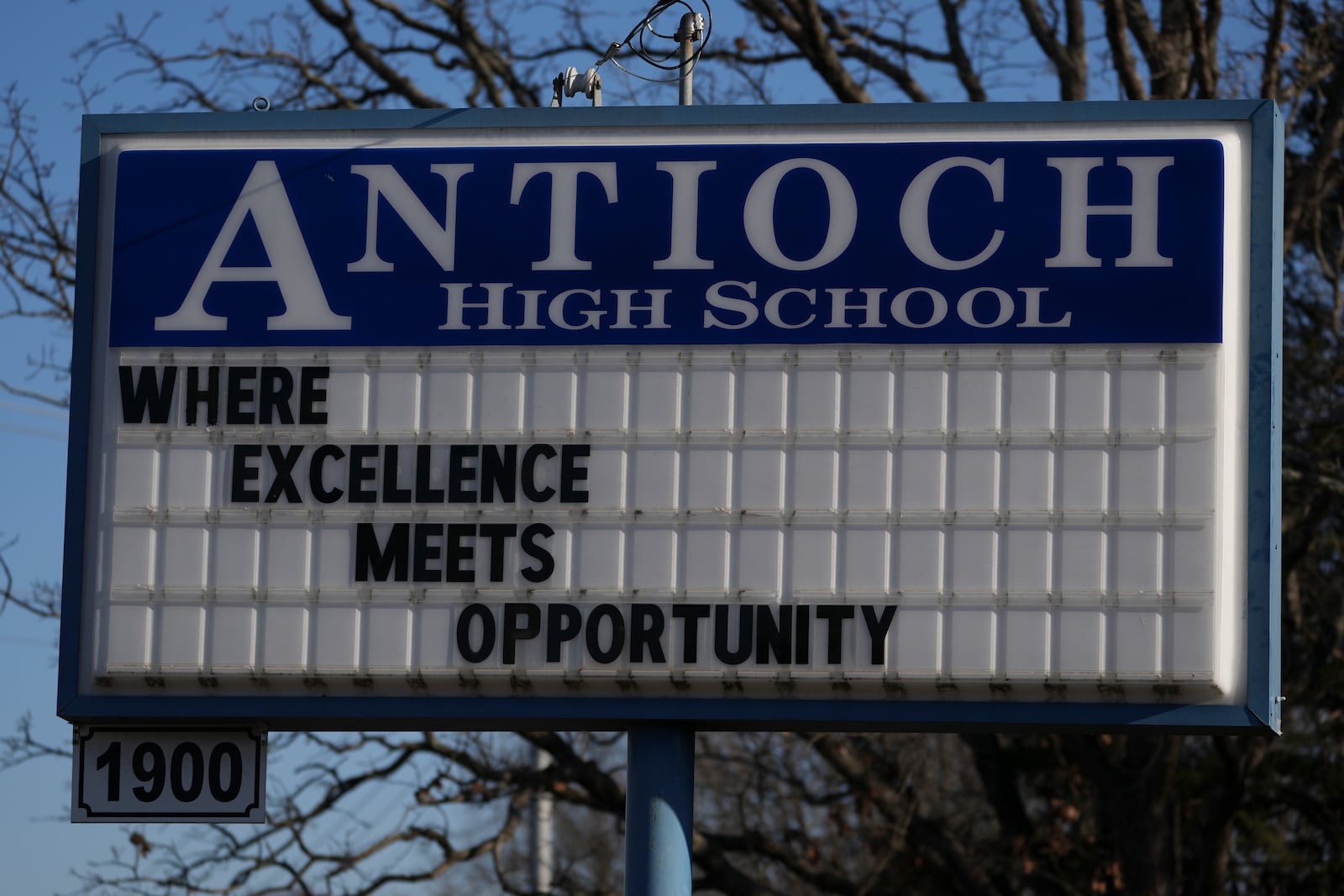 A sign outside Antioch High School is seen, Thursday, Jan. 23, 2025, in Nashville, Tenn. (AP Photo/George Walker IV)