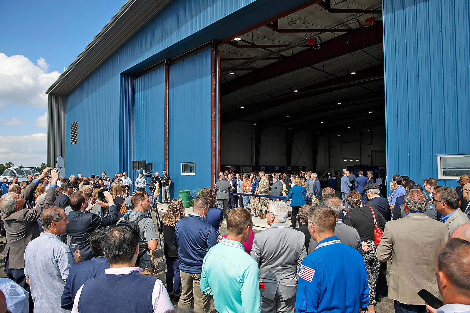 Springfield, state and national officials cut the ribbon for the new National Advanced Air Mobility Center of Excellence at Springfield-Beckley Airport Monday, Sept. 18, 2023. BILL LACKEY/STAFF