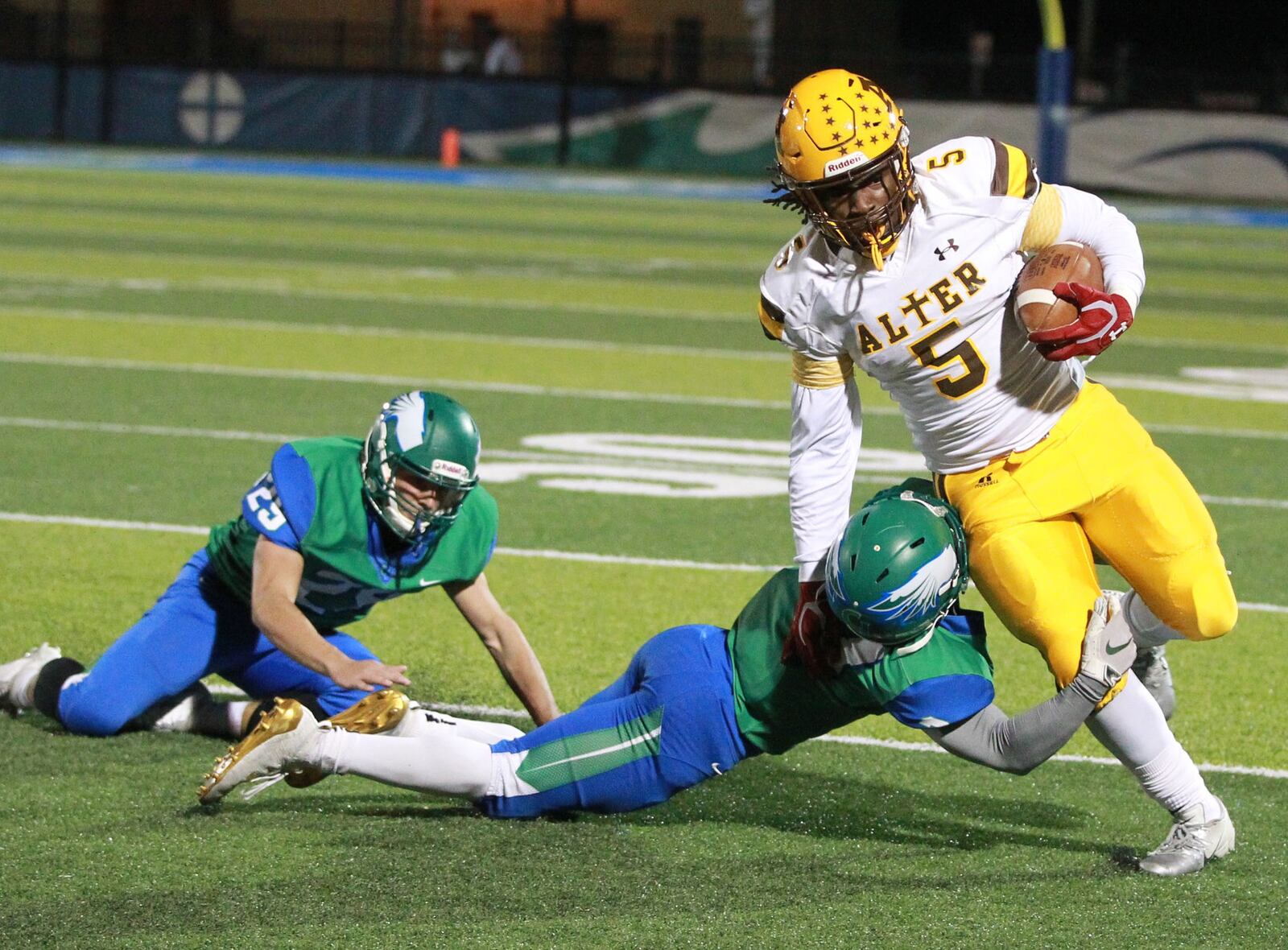 Branden McDonald (with ball) turns the corner on Mark White of Chaminade Julienne. Alter defeated host CJ 35-28 in a Week 10 high school football game on Friday, Nov. 1, 2019. MARC PENDLETON / STAFF