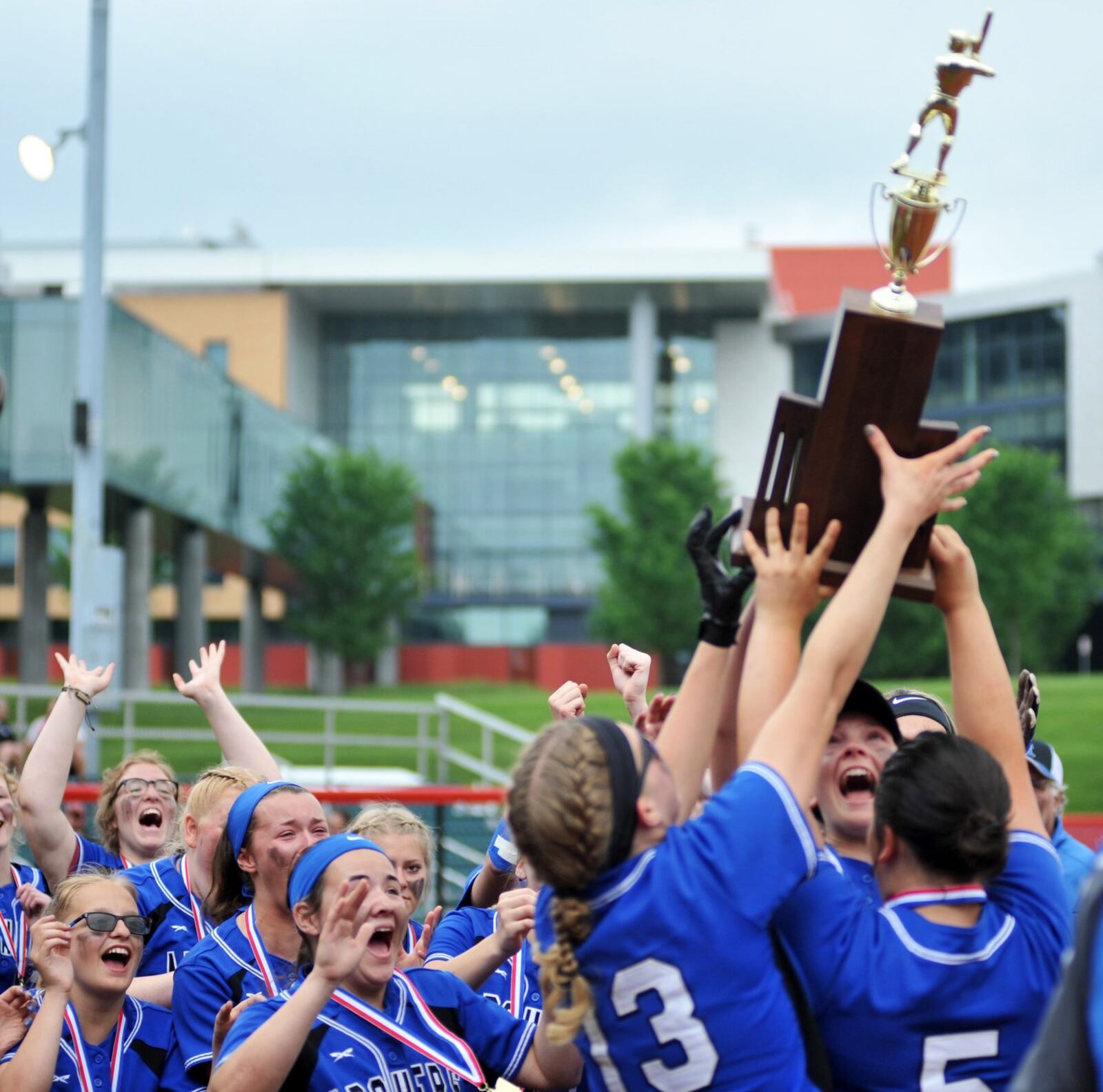 The Antwerp softball team celebrates winning the Division IV state championship Sunday after its 5-0 triumph over Mechanicsburg at Firestone Stadium in Akron. RICK CASSANO/STAFF