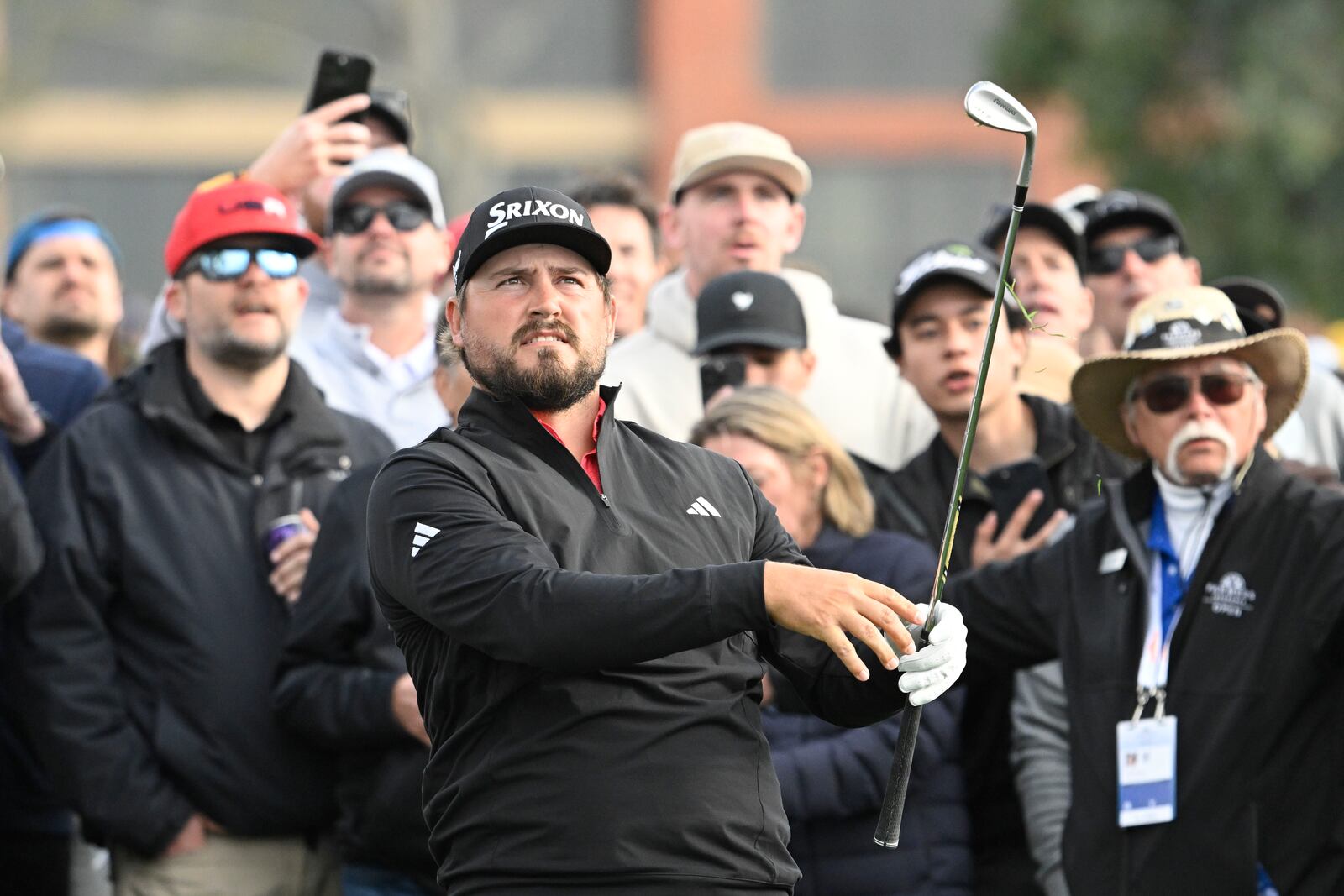 Andrew Novak hits his second shot on the 14th hole on the South Course at Torrey Pines during the final round of the Farmers Insurance Open golf tournament Saturday, Jan. 25, 2025, in San Diego. (AP Photo/Denis Poroy)