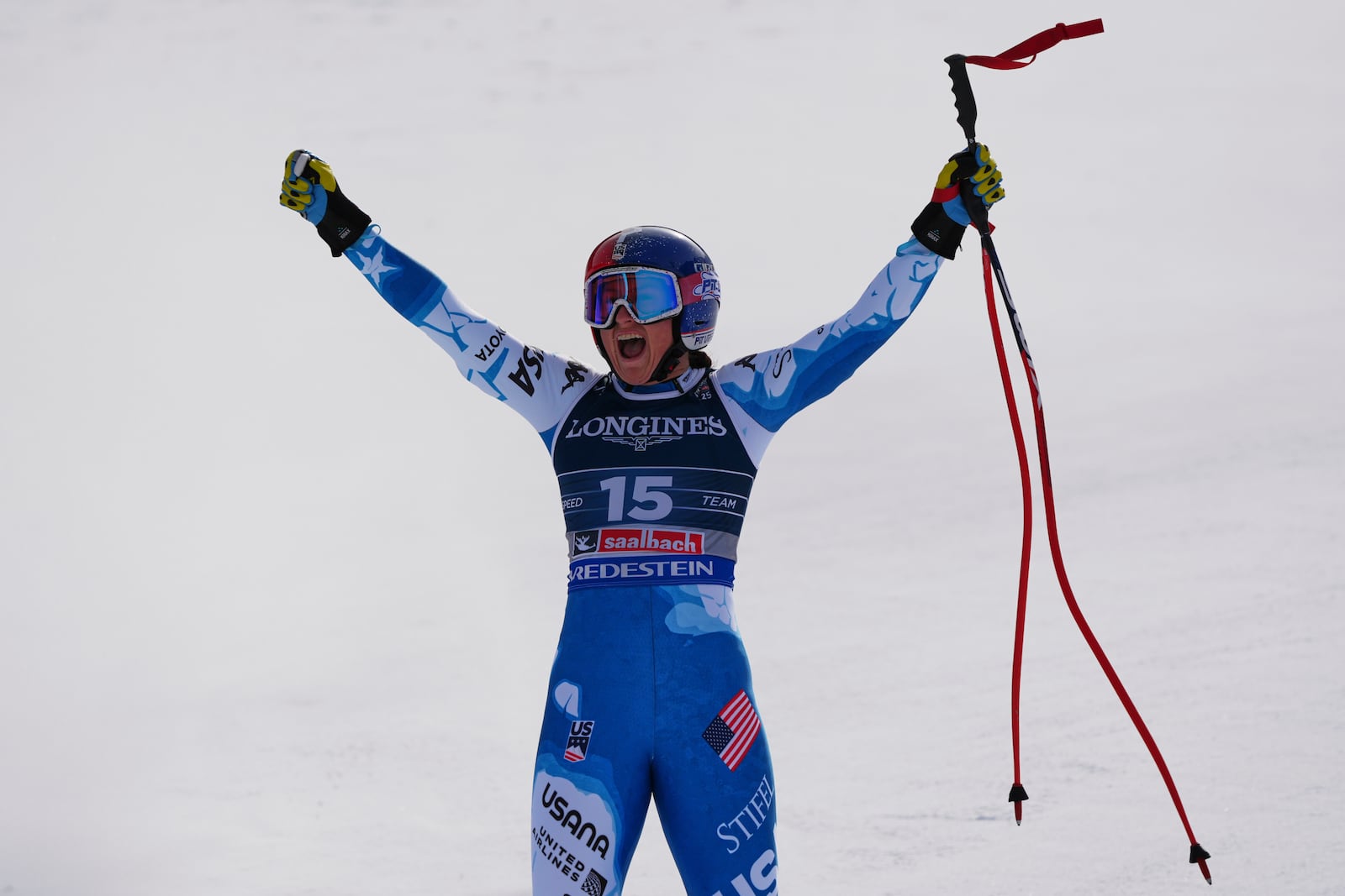 United States' Lauren Macuga celebrates at the finish area of a downhill run of a women's team combined event, at the Alpine Ski World Championships, in Saalbach-Hinterglemm, Austria, Tuesday, Feb. 11, 2025. (AP Photo/Giovanni Auletta)