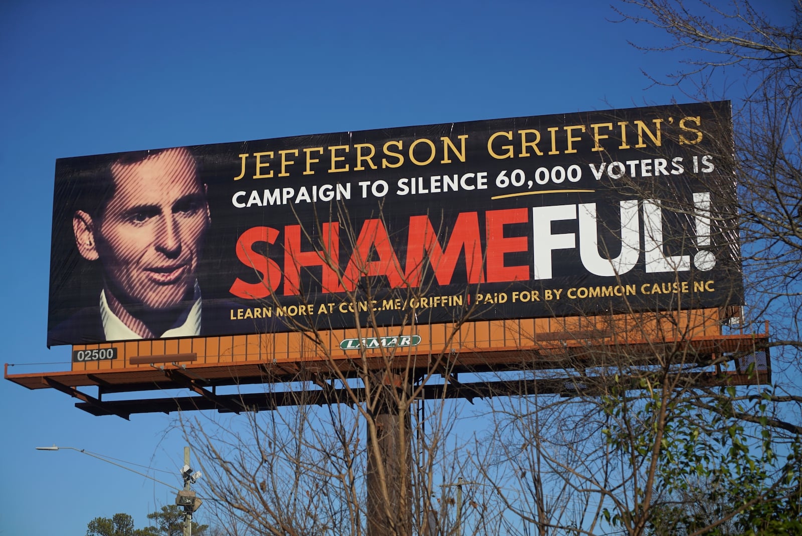 A billboard criticizing Republican state Supreme Court candidate Jefferson Griffin is seen on Capital Boulevard in Raleigh, N.C., Wednesday, Jan. 15, 2025. (AP Photo/Allen G. Breed)