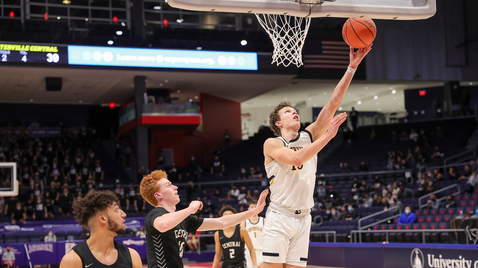 Centerville's Rich Rolf puts up a shot in the paint during Sunday's Division I state title game vs. Westerville Central at UD Arena. Michael Cooper/CONTRIBUTED