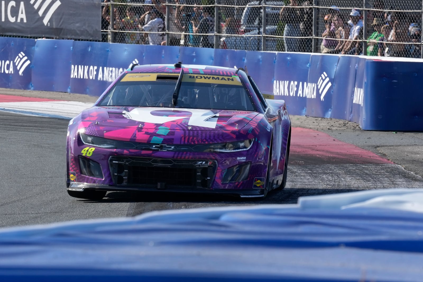 Alex Bowman drives out of Turn 3 during a NASCAR Cup Series auto race at Charlotte Motor Speedway in Concord, N.C., Sunday, Oct. 13, 2024. (AP Photo/Chuck Burton)