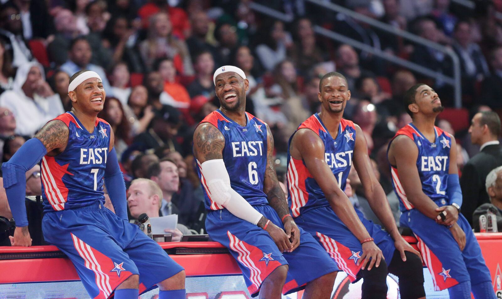 FILE - East Team members from left, Carmelo Anthony, LeBron James, Chris Bosh and Kyrie Irving laugh as they watch from the sideline during the first half of the NBA All-Star basketball game Sunday, Feb. 17, 2013, in Houston. (AP Photo/Eric Gay, File)