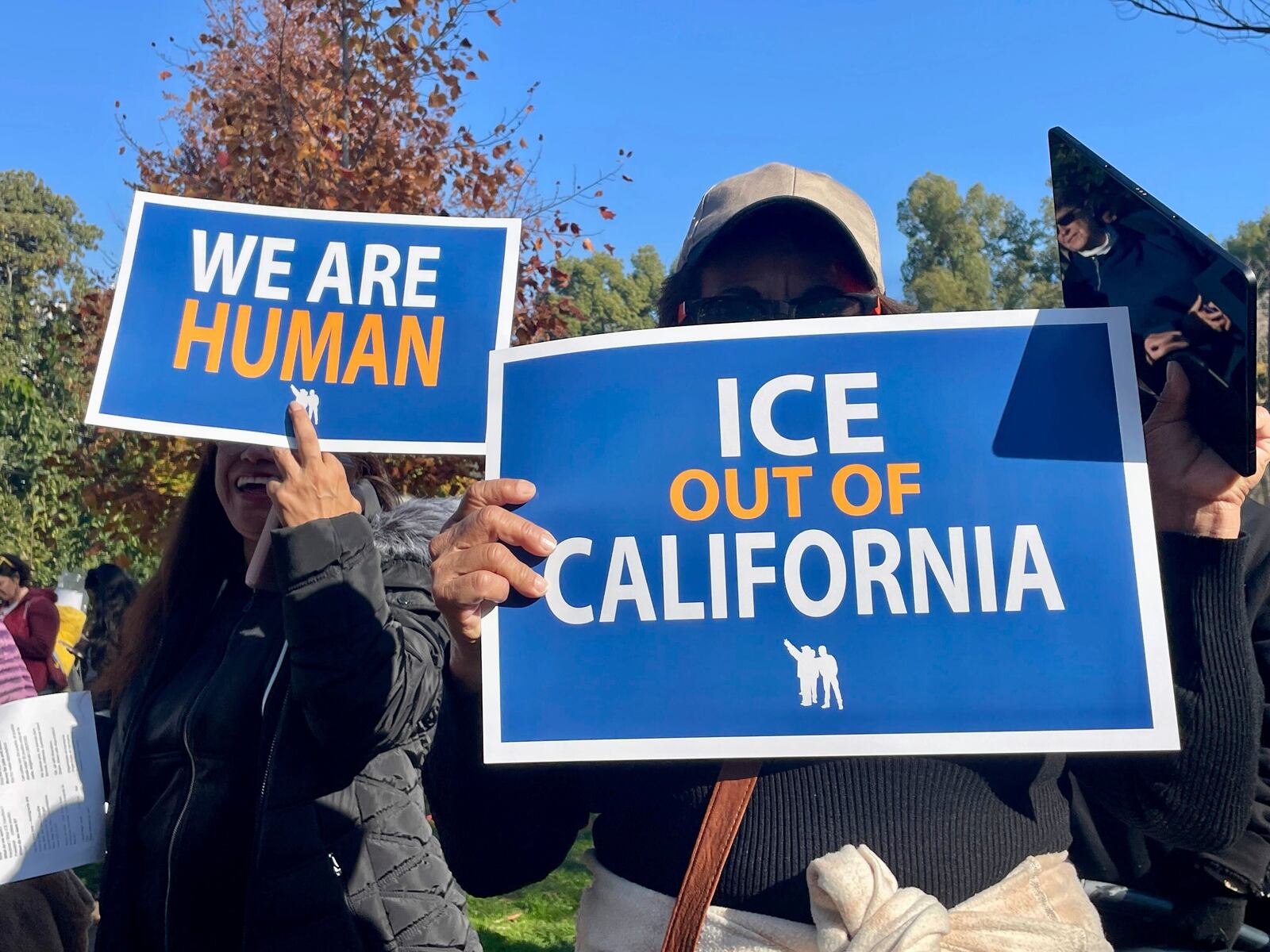 Immigration advocates hold a rally in Sacramento, Calif. on Monday, Dec. 2, 2024, to protest President-Elect Donald Trump's plans to conduct mass deportation of immigrants without legal status. (AP Photo/Haven Daley)