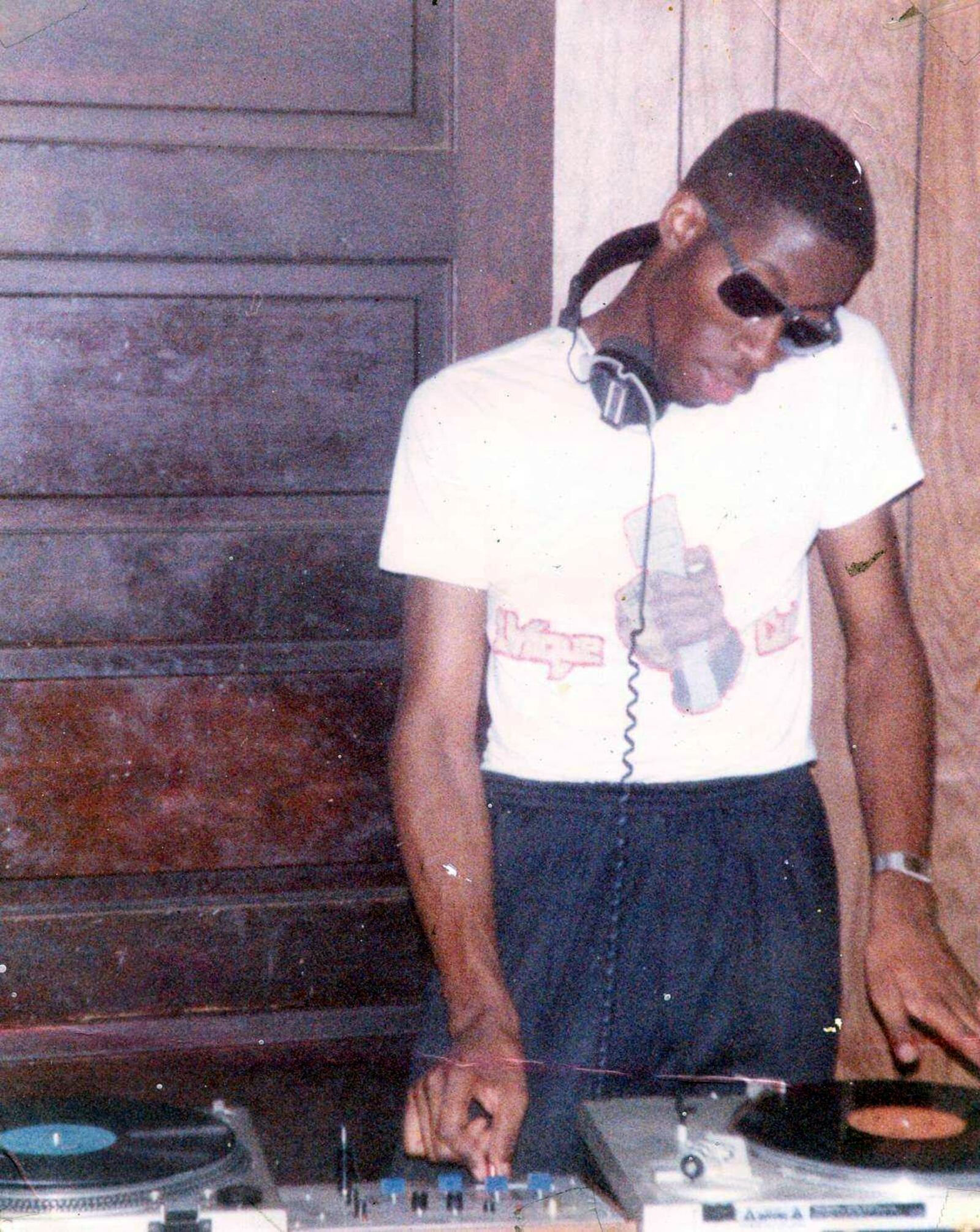 For the last 15 years DJ Skno has been a DJ and director of music programming for the CORE DJ Radio Show On Sirius XM Radio Shade45. He started DJ in 1983 and has worked at several local radio stations.  Pictured in 1983.