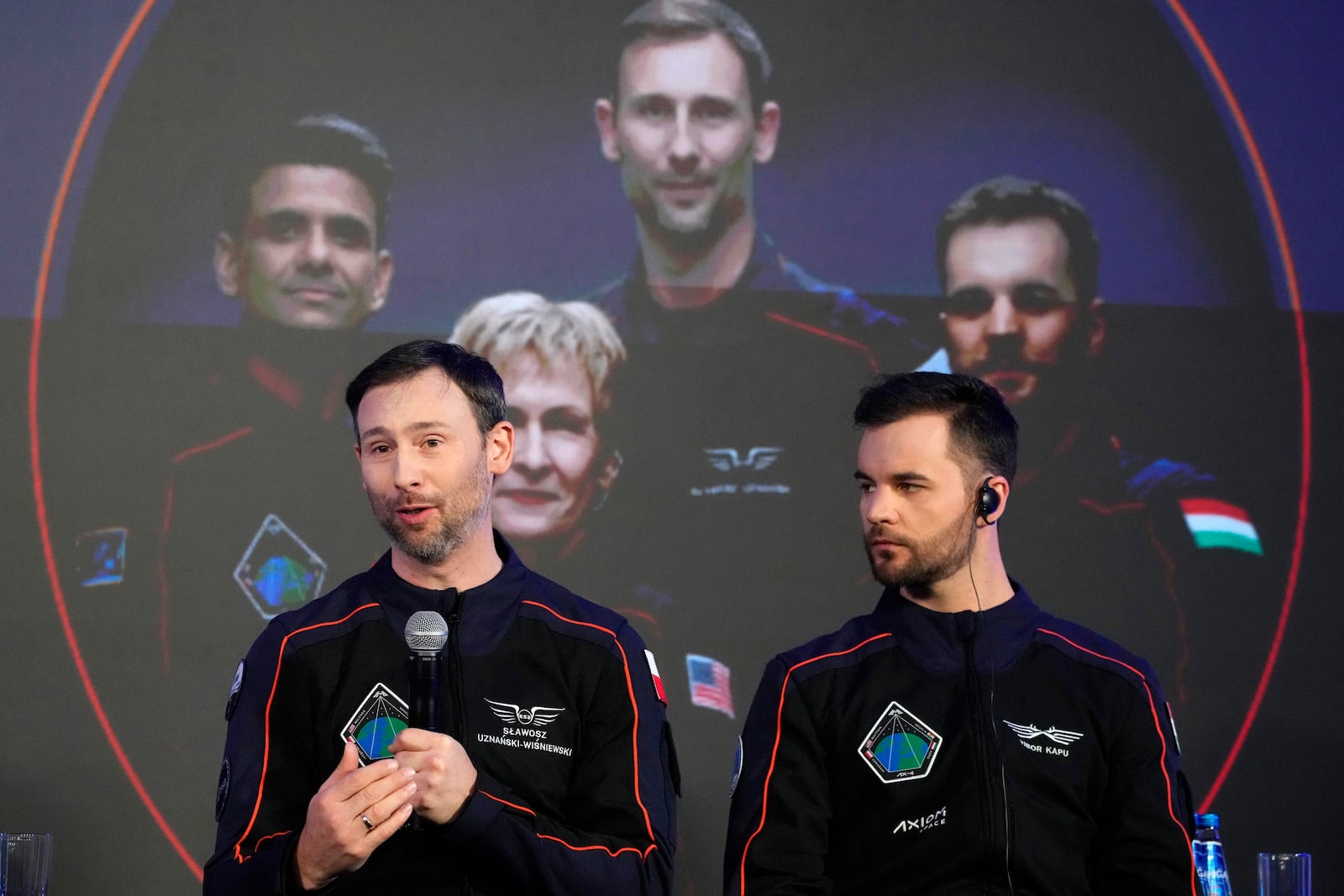 Ax-4 scientific space mission with crew members Slawosz Uznanski-Wisniewski of Poland, left, and Tibor Kapu of Hungary during a media event where they talked about their preparations, at the Copernicus Science Center in Warsaw, Poland, Wednesday, Feb. 5, 2025. (AP Photo/Czarek Sokolowski)