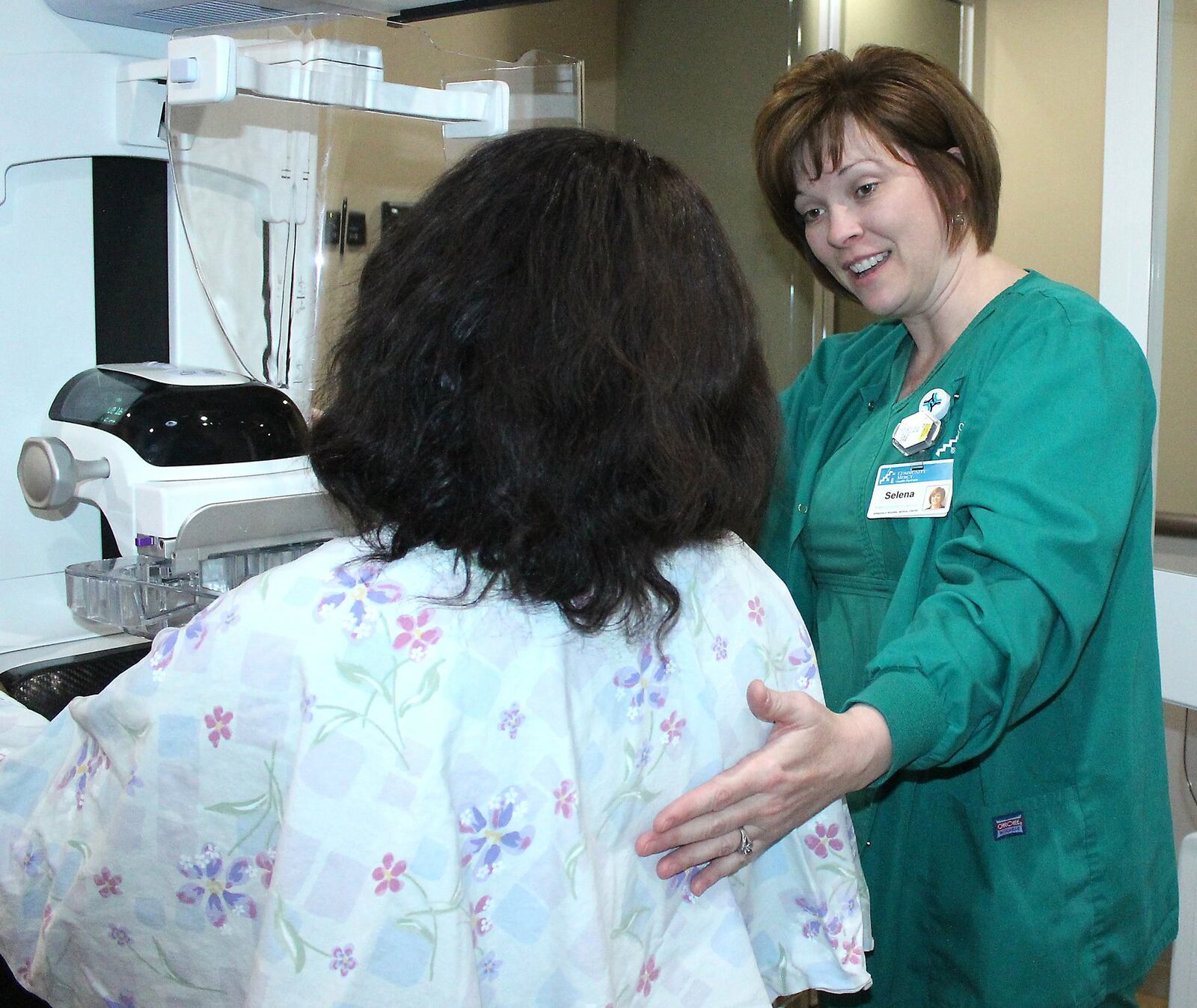 Selena Kemper, mammography supervisor at Springfield Regional Imaging Center explains the breast screening process in the MERCY HEALTH 3D mobile mammography vehicle. JEFF GUERINI/STAFF