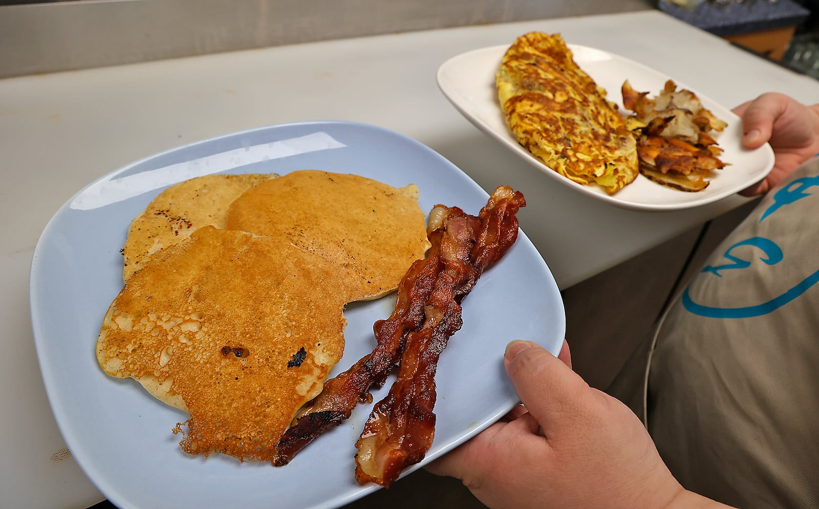 A breakfast order, hot off the grill, at Vittles & Grits in Lawrenceville Monday, Jan. 30, 2023. BILL LACKEY/STAFF