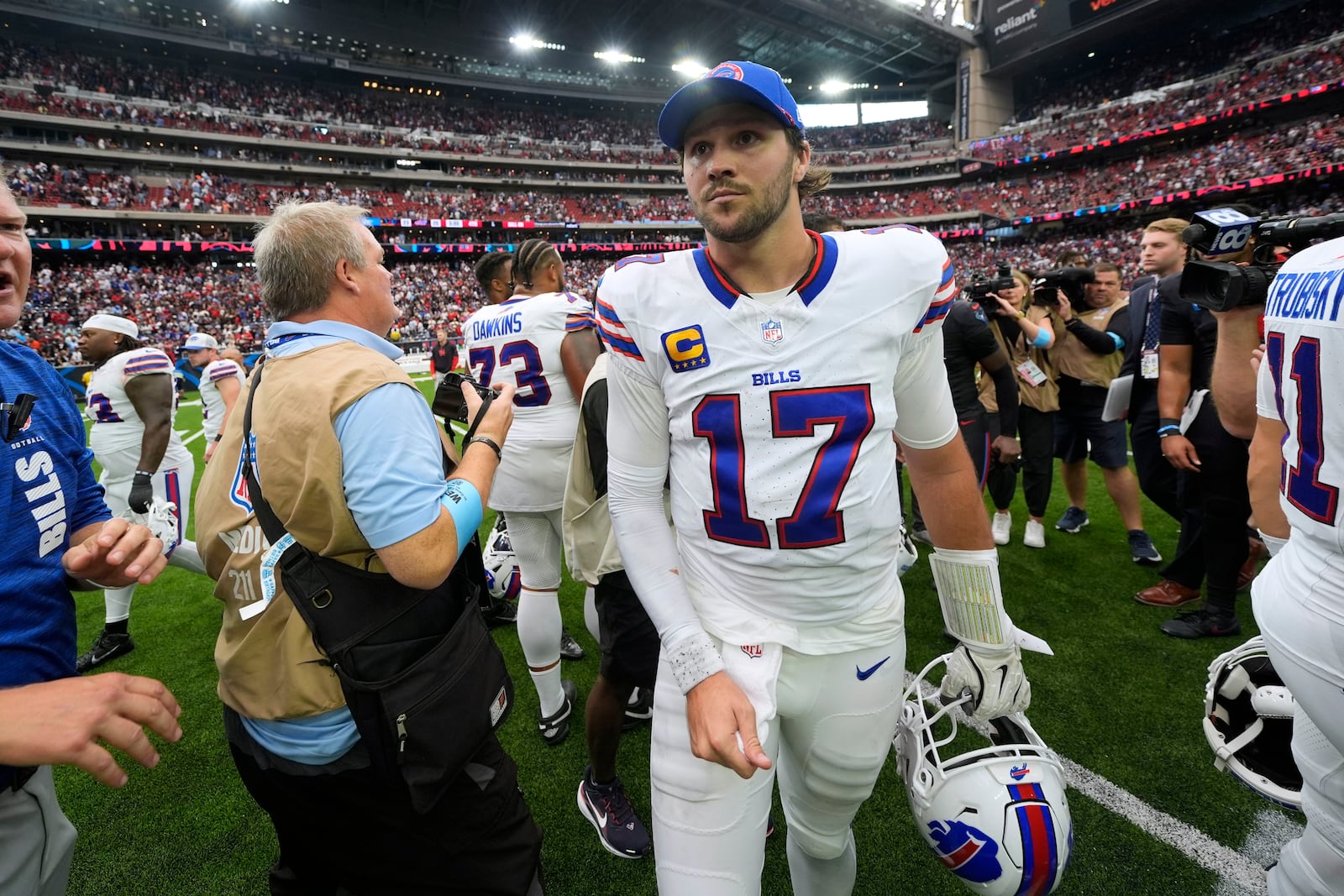 Buffalo Bills quarterback Josh Allen (17) walks off the field after an NFL football game against the Houston Texans, Sunday, Oct. 6, 2024, in Houston. The Texans won 23-20. (AP Photo/Eric Gay)