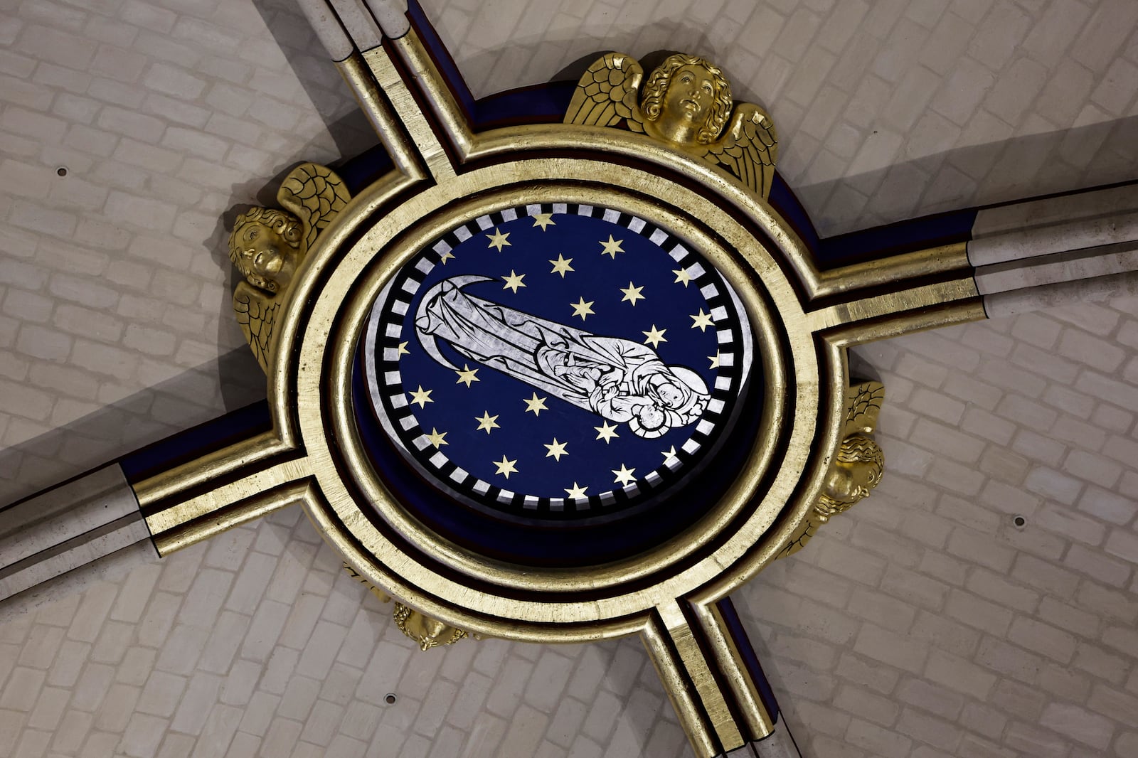 A base under the arrow is seen inside Notre-Dame de Paris cathedral while French President Emmanuel Macron visits the restored interiors of the monument, Friday Nov. 29, 2024, in Paris. (Stephane de Sakutin, Pool via AP)