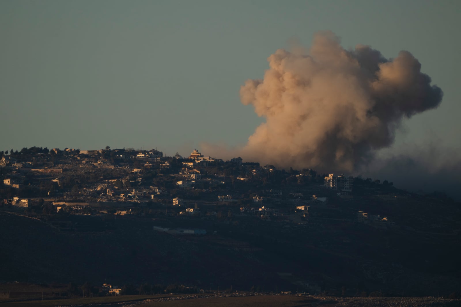 Smoke rises following Israeli bombardment in southern Lebanon as seen from northern Israel, Tuesday, Nov. 26, 2024. (AP Photo/Leo Correa)