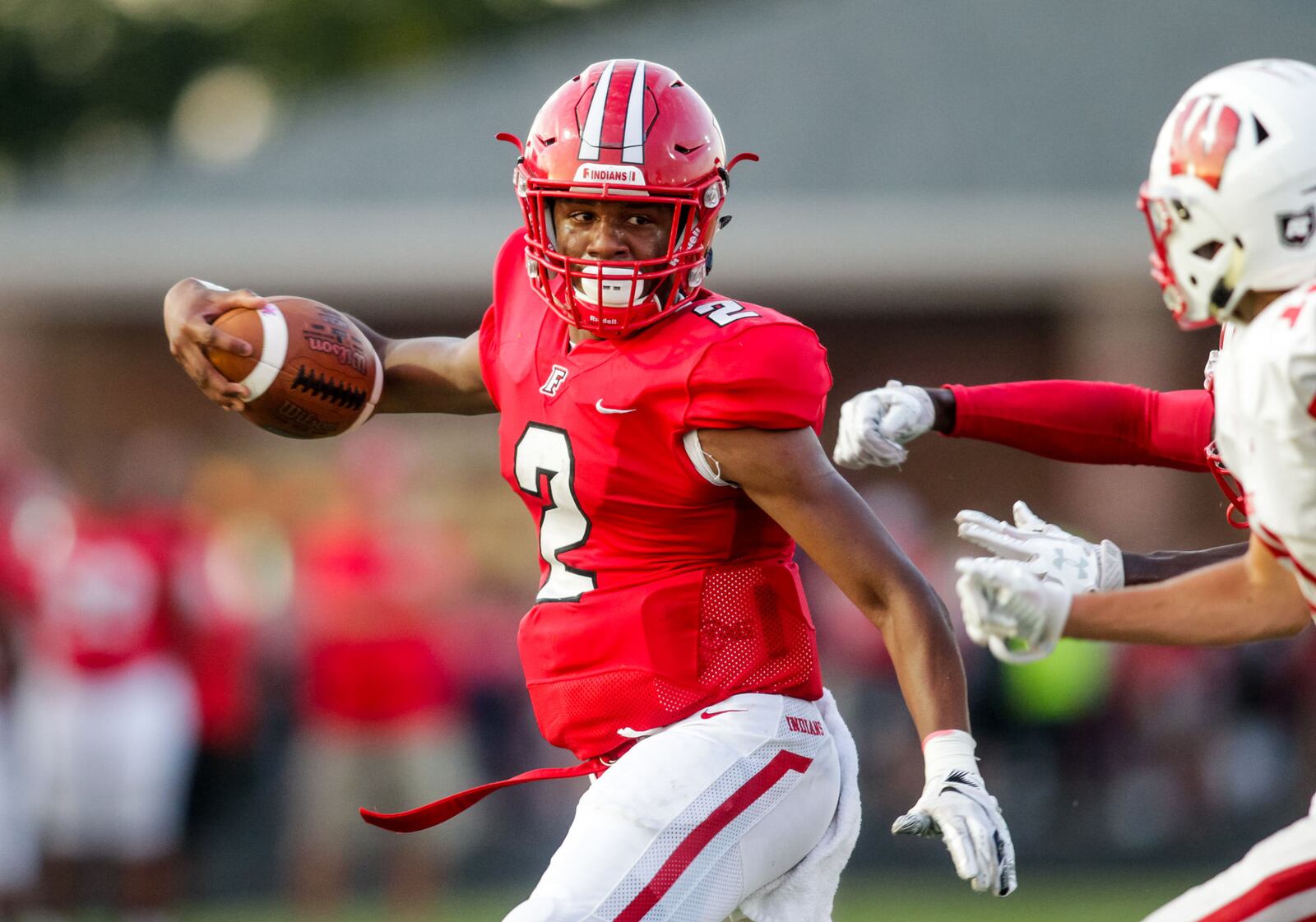 Fairfield quarterback Sawiaha Ellis carries the football during their game against Lakota West Friday, Sept. 14 at Fairfield Stadium. Fairfield won 37-3. NICK GRAHAM/STAFF