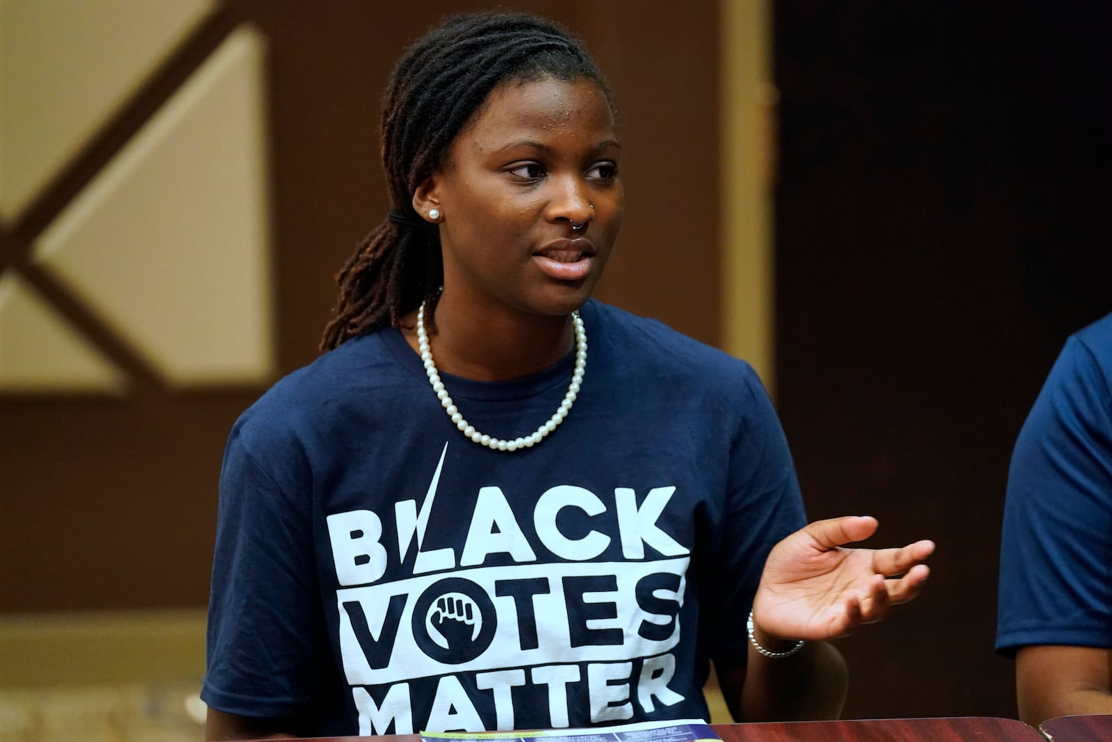 Bennett College student Zairen Jackson gestures as she answers a question during a roundtable in Greensboro, N.C., Tuesday, Oct. 8, 2024. (AP Photo/Chuck Burton)