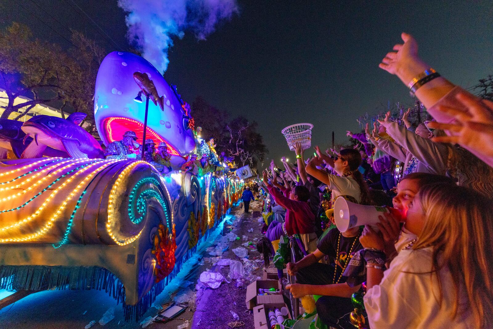 "Louisiana Fairs and Festivals" is the theme as the Krewe of Bacchus rolls through the streets of New Orleans, Sunday, March 2, 2025. (Chris Granger/The Times-Picayune/The New Orleans Advocate via AP)