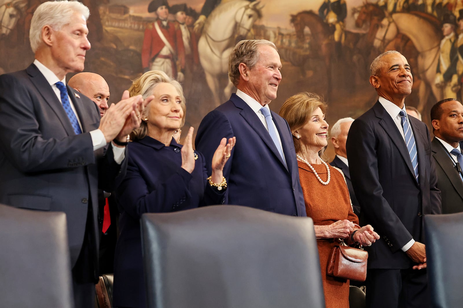 From left, former President Bill Clinton, former Secretary of State Hillary Clinton, former President George W. Bush, former first lady Laura Bush and former President Barack Obama, arrive before the 60th Presidential Inauguration in the Rotunda of the U.S. Capitol in Washington, Monday, Jan. 20, 2025. (Chip Somodevilla/Pool Photo via AP)