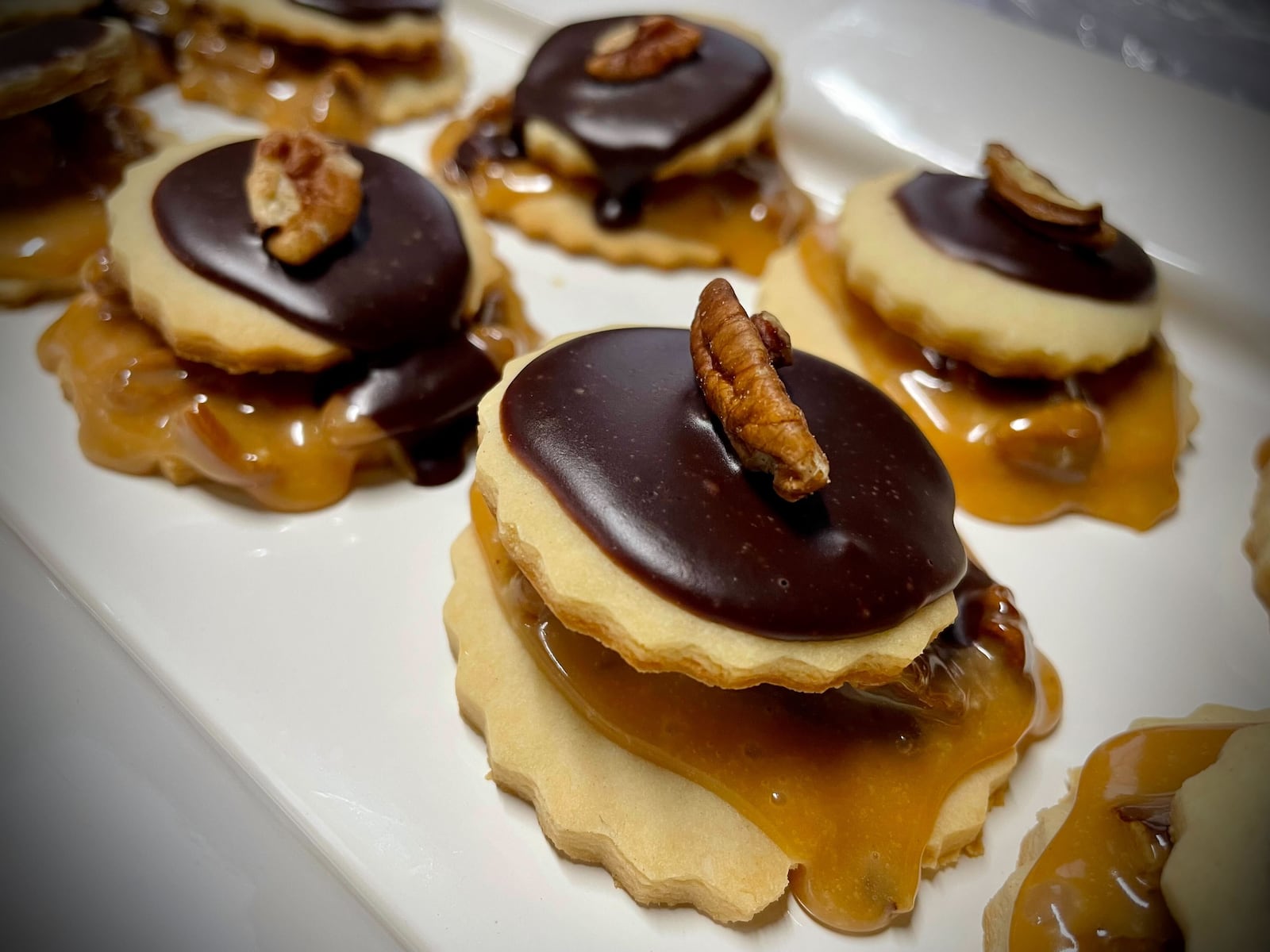 The Dayton Daily News Holiday Cookie Contest returned this year with area bakers submitting nearly 30 of their very best recipes. A panel of judges selected the top three cookies. Pictured are Candy Bar Cookies. NATALIE JONES/STAFF