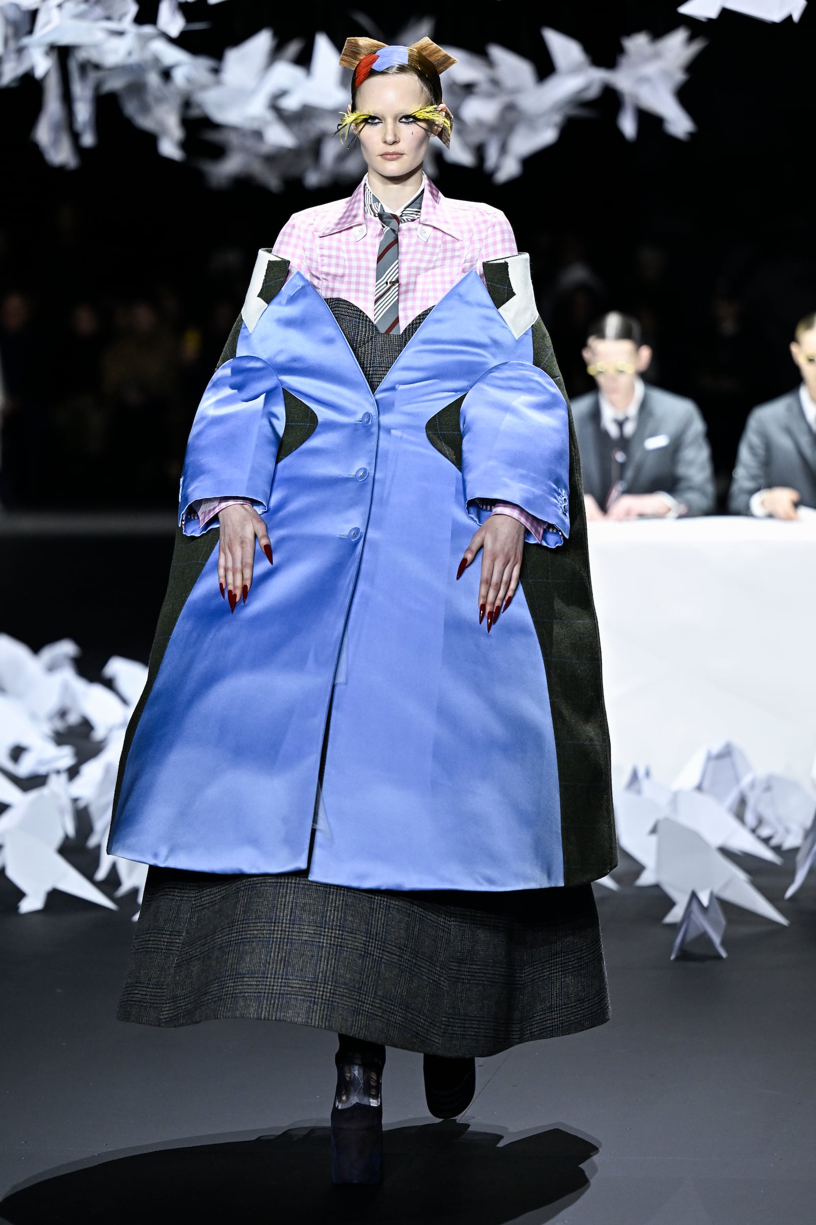 A model walks the runway during the Thom Browne Fall/Winter 2025 fashion show as part of New York Fashion Week on Tuesday, Feb. 11, 2025, at The Shed in New York. (Photo by Evan Agostini/Invision/AP)