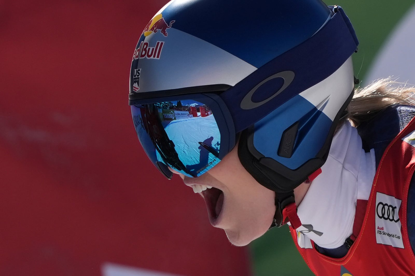 United States Lindsey Vonn reacts after completing an alpine ski, women's World Cup downhill race, in St. Anton, Austria, Saturday, Jan. 11, 2025. (AP Photo/Giovanni Auletta)