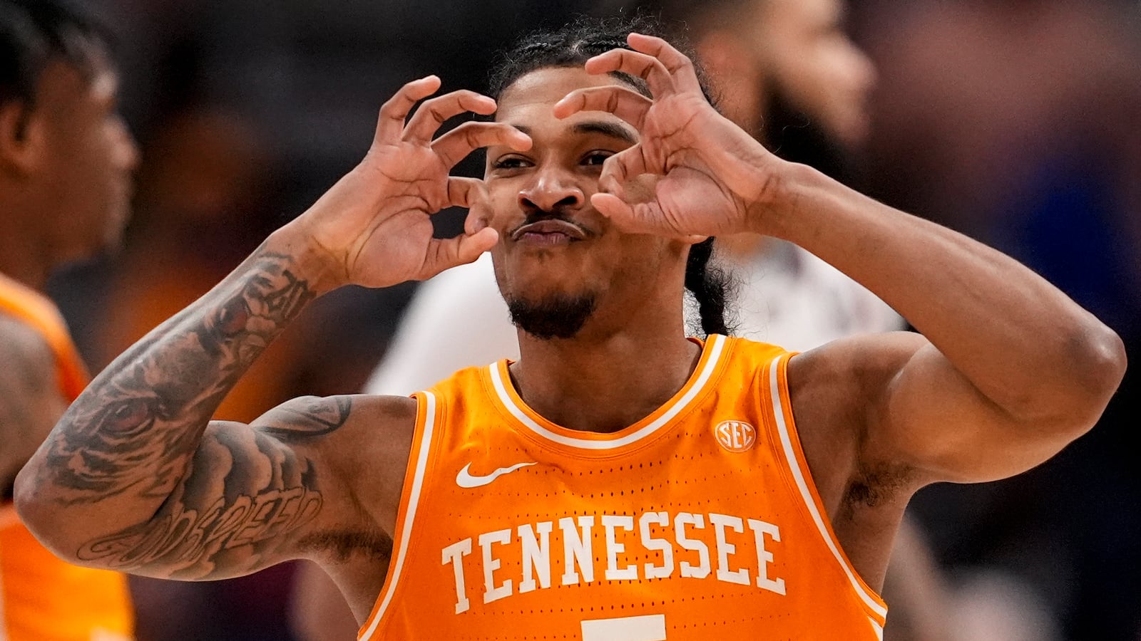 Tennessee guard Zakai Zeigler (5) celebrates after a basket against Auburn during the second half of an NCAA college basketball game in the semifinal round of the Southeastern Conference tournament, Saturday, March 15, 2025, in Nashville, Tenn. (AP Photo/George Walker IV)