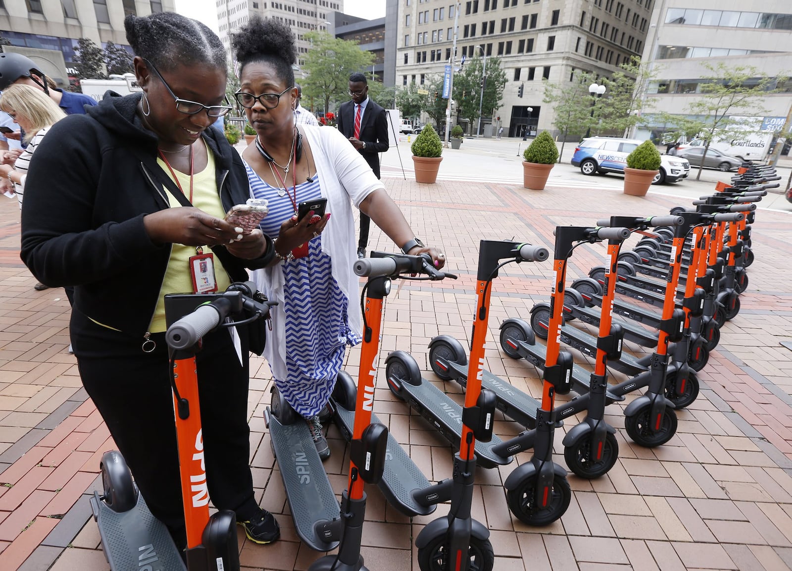 A company could bring electric scooters similar to these to downtown Springfield. STAFF