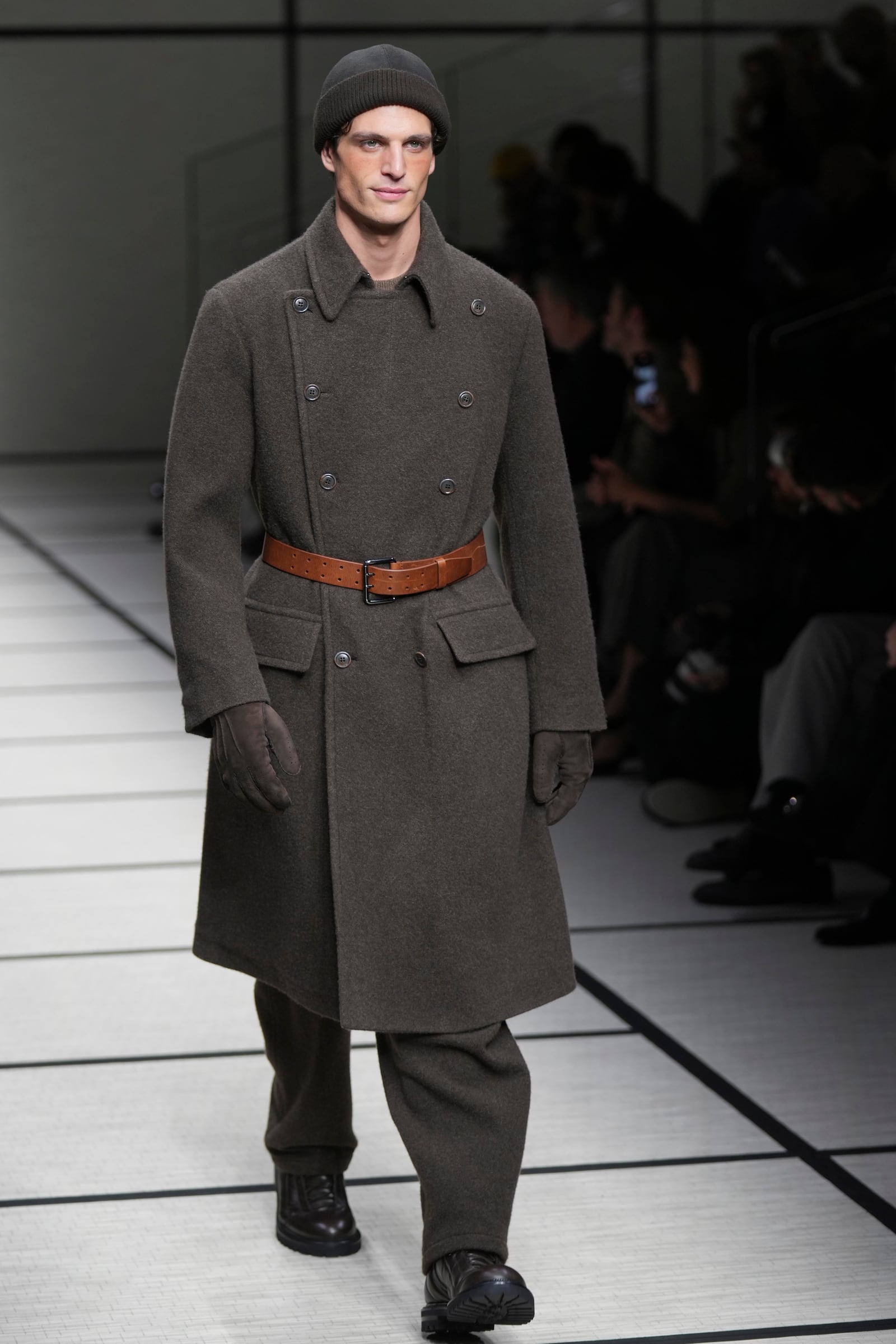 A model wears a creation part of the men's Giorgio Armani Fall-Winter 2025-2026 collection, that was presented in Milan, Italy, Monday, Jan. 20, 2025. (AP Photo/Antonio Calanni)