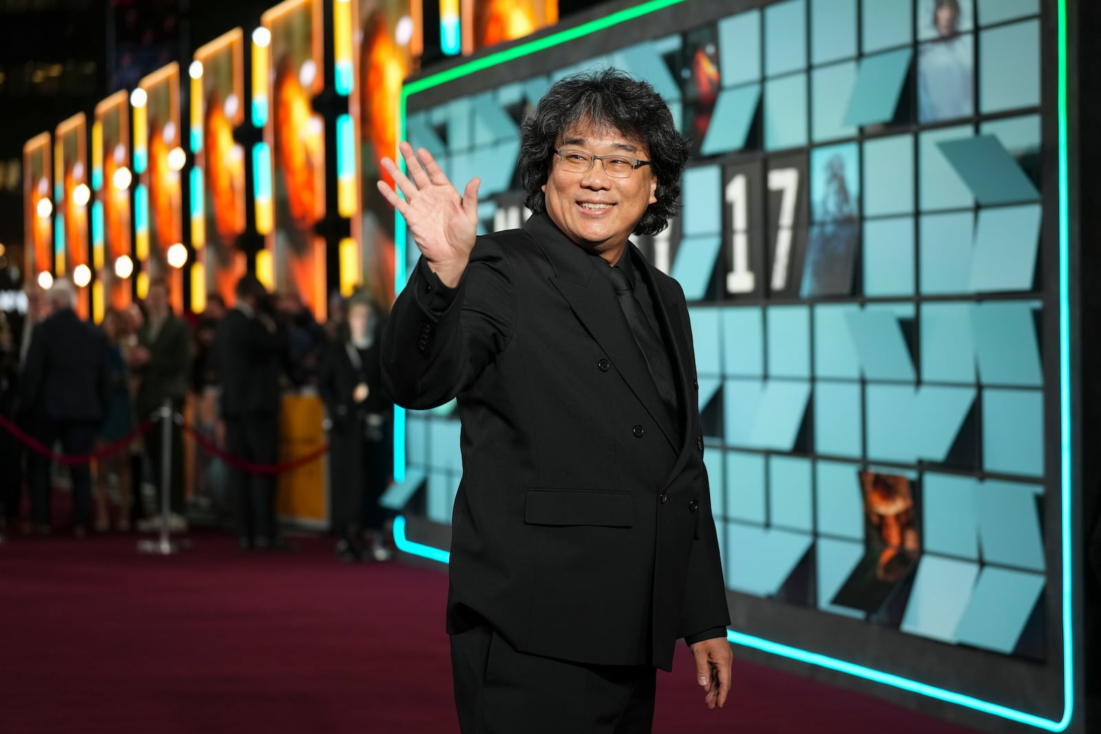 Director Bong Joon-Ho poses for photographers upon arrival at the World premiere for the film 'Mickey 17' on Thursday, Feb. 13, 2025, in London. (Photo by Scott A Garfitt/Invision/AP)