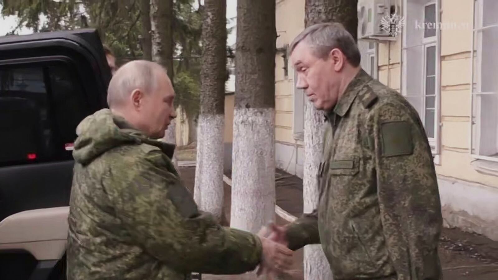 In this image made from video released by the Russian Presidential Press Service, on Wednesday, March 12, 2025, Russian President Vladimir Putin, left, shakes hands with Russian Chief of General Staff Gen. Valery Gerasimov as he visits military headquarters in the Kursk region of Russia. (Russian Presidential Press Service via AP)