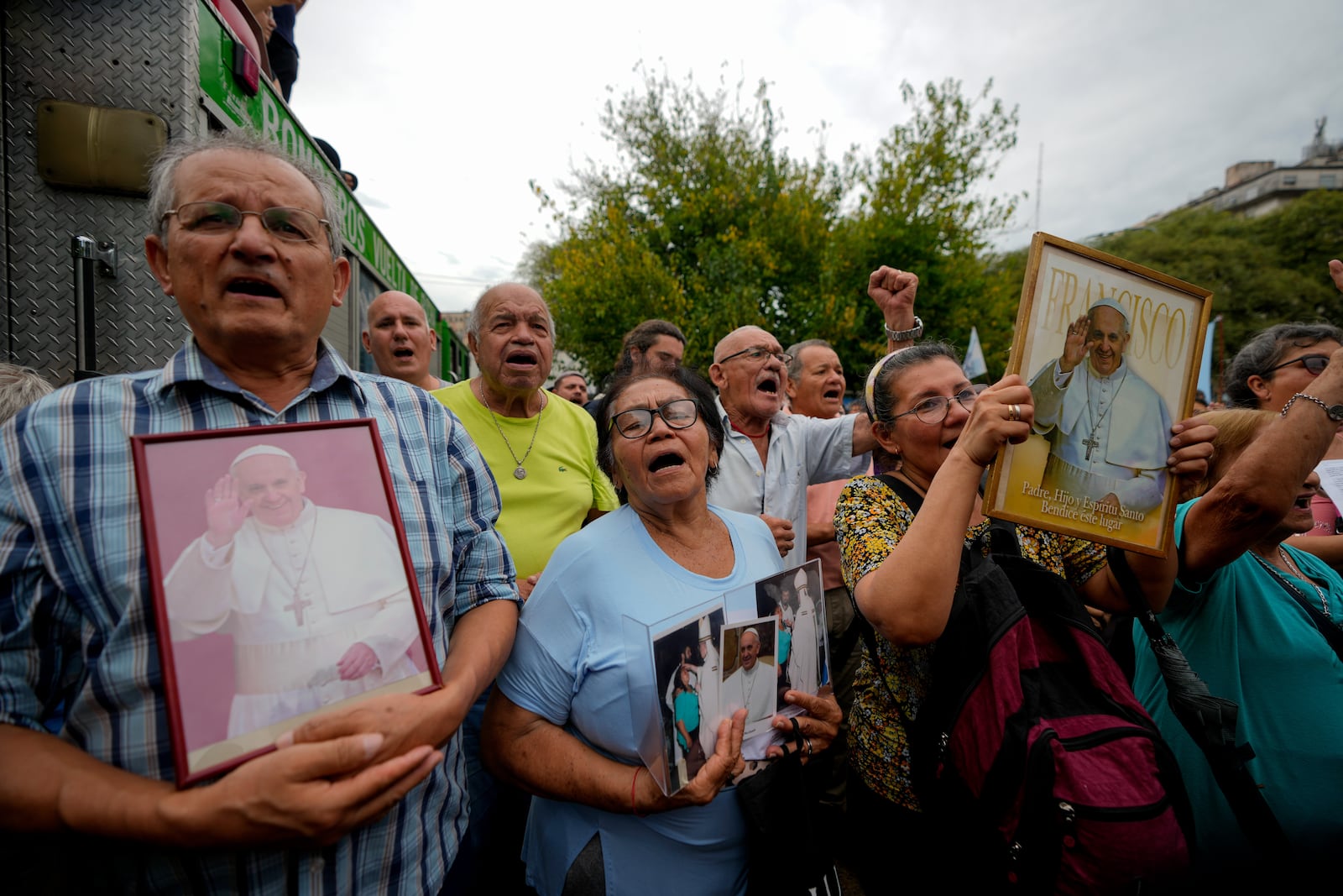 People attend a Mass to pray for Pope Francis' health in Constitution square in Buenos Aires, Argentina, Monday, Feb. 24, 2025. (AP Photo/Natacha Pisarenko)