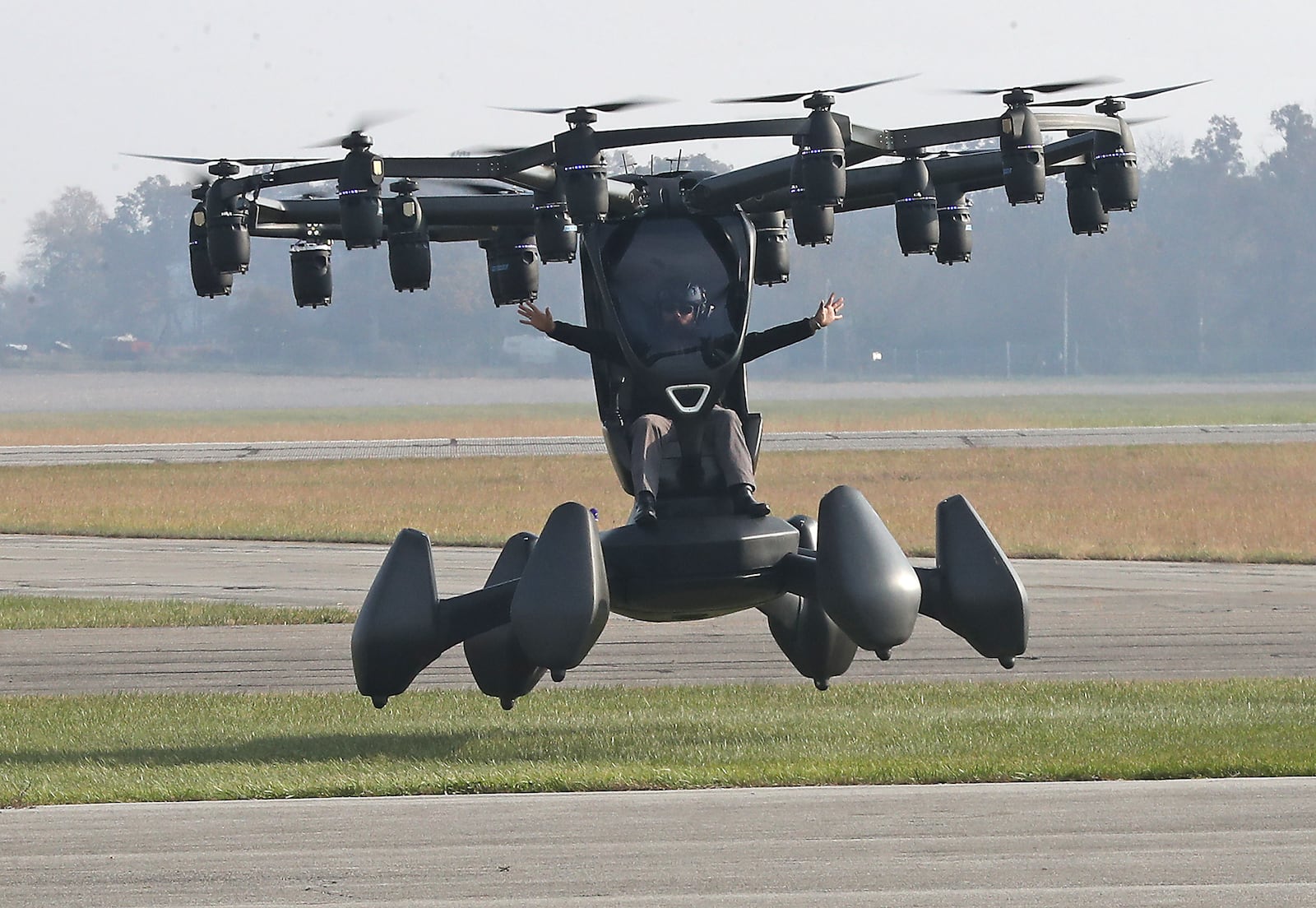 The Lift Aircraft pilot demonstrates their advanced air mobility system, or flying car, Wednesday during the Advanced Air Mobility Showcase at Springfield-Beckley Municipal Airport. The event featured some of the top companies in the world of advanced air mobility systems as they showed their flying vehicles and the technology that make them possible. BILL LACKEY/STAFF